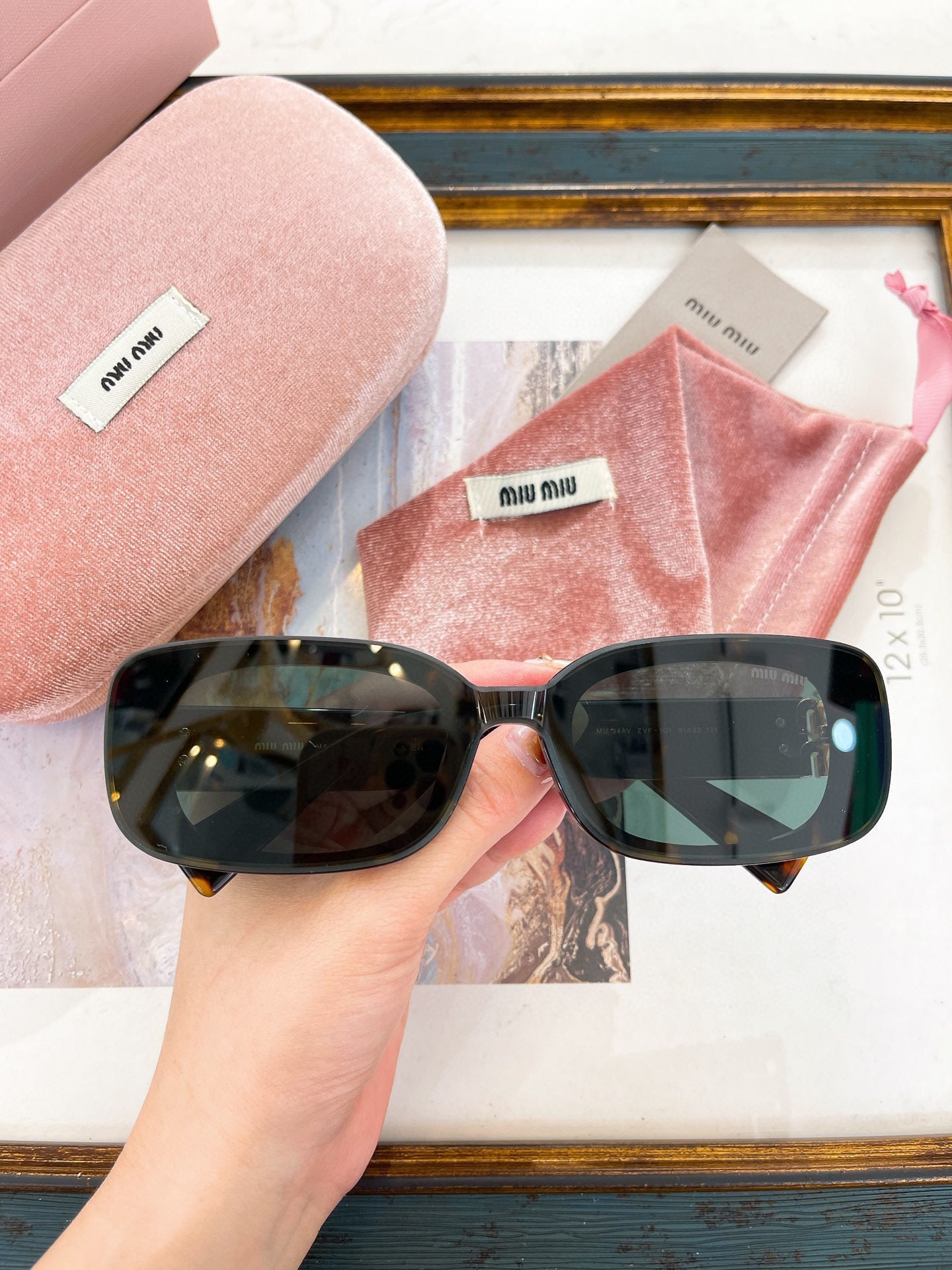 MIU M SUNGLASSES