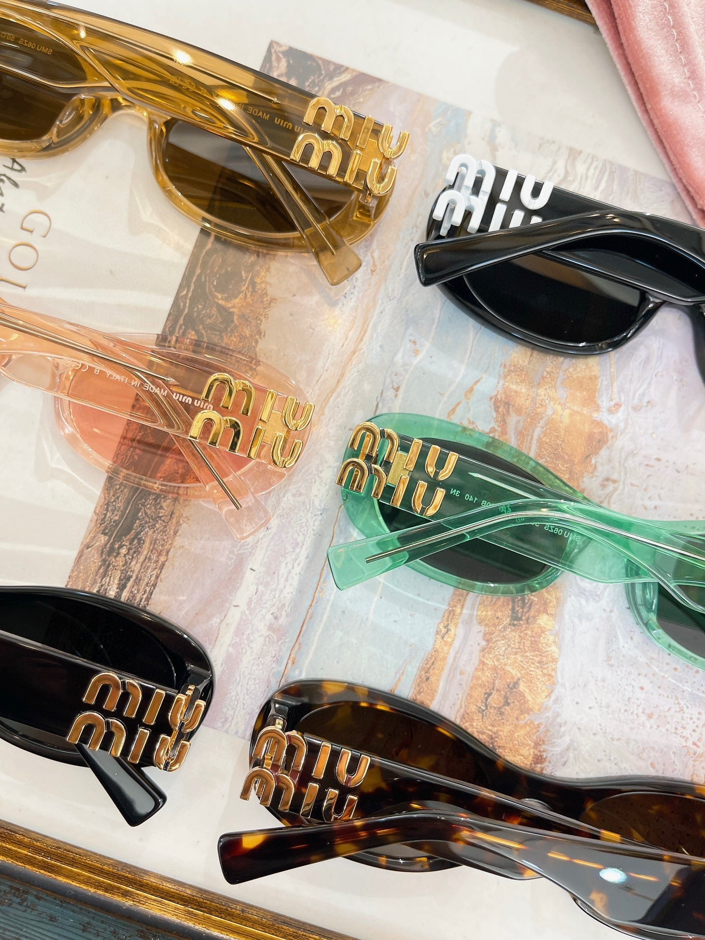MIU M SUNGLASSES