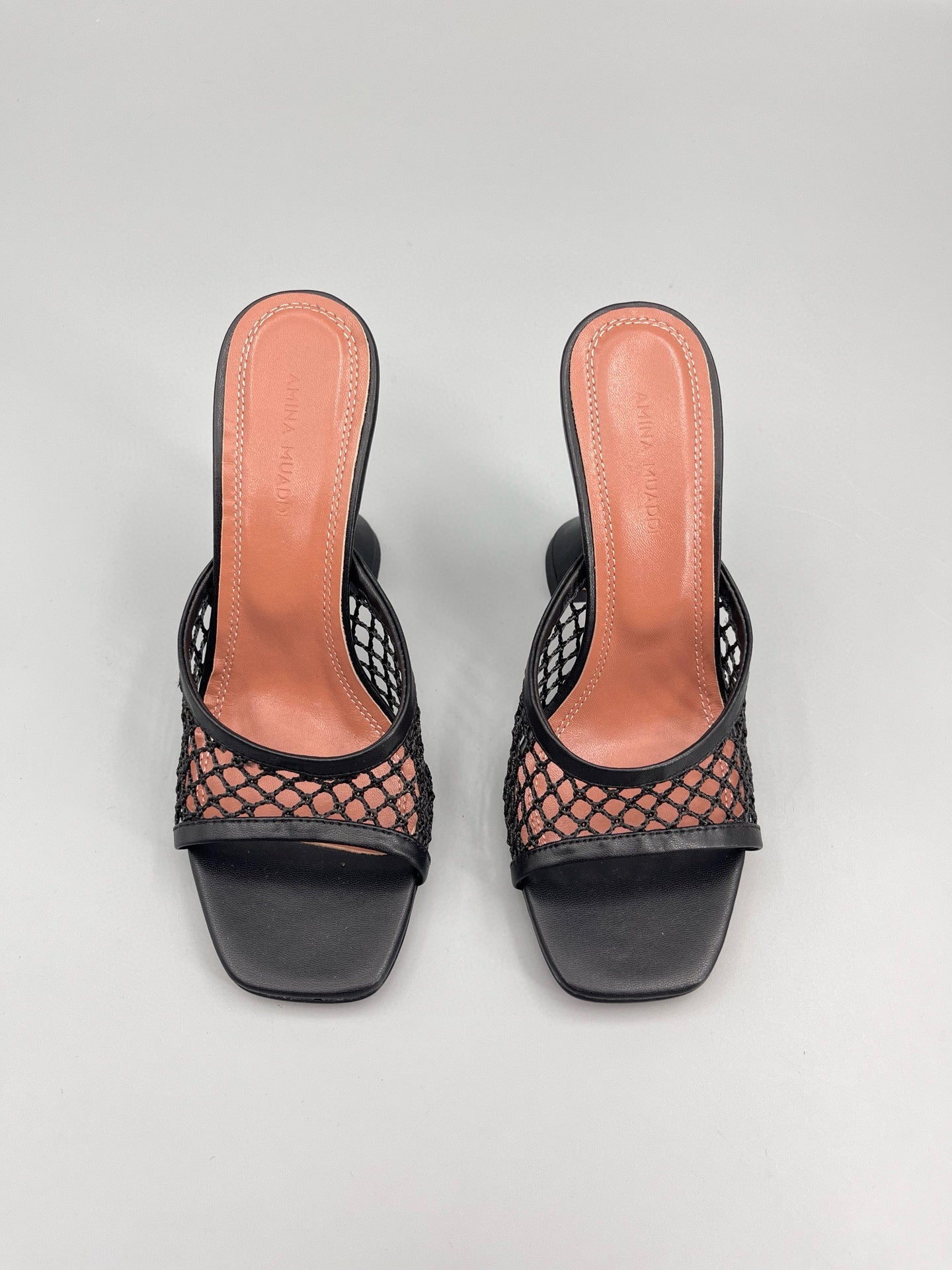 AMINA M HEELS