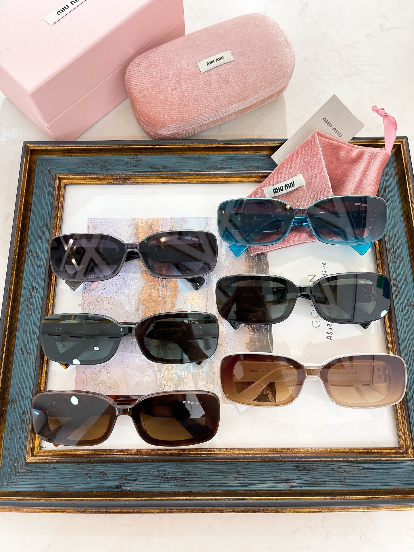 MIU M SUNGLASSES
