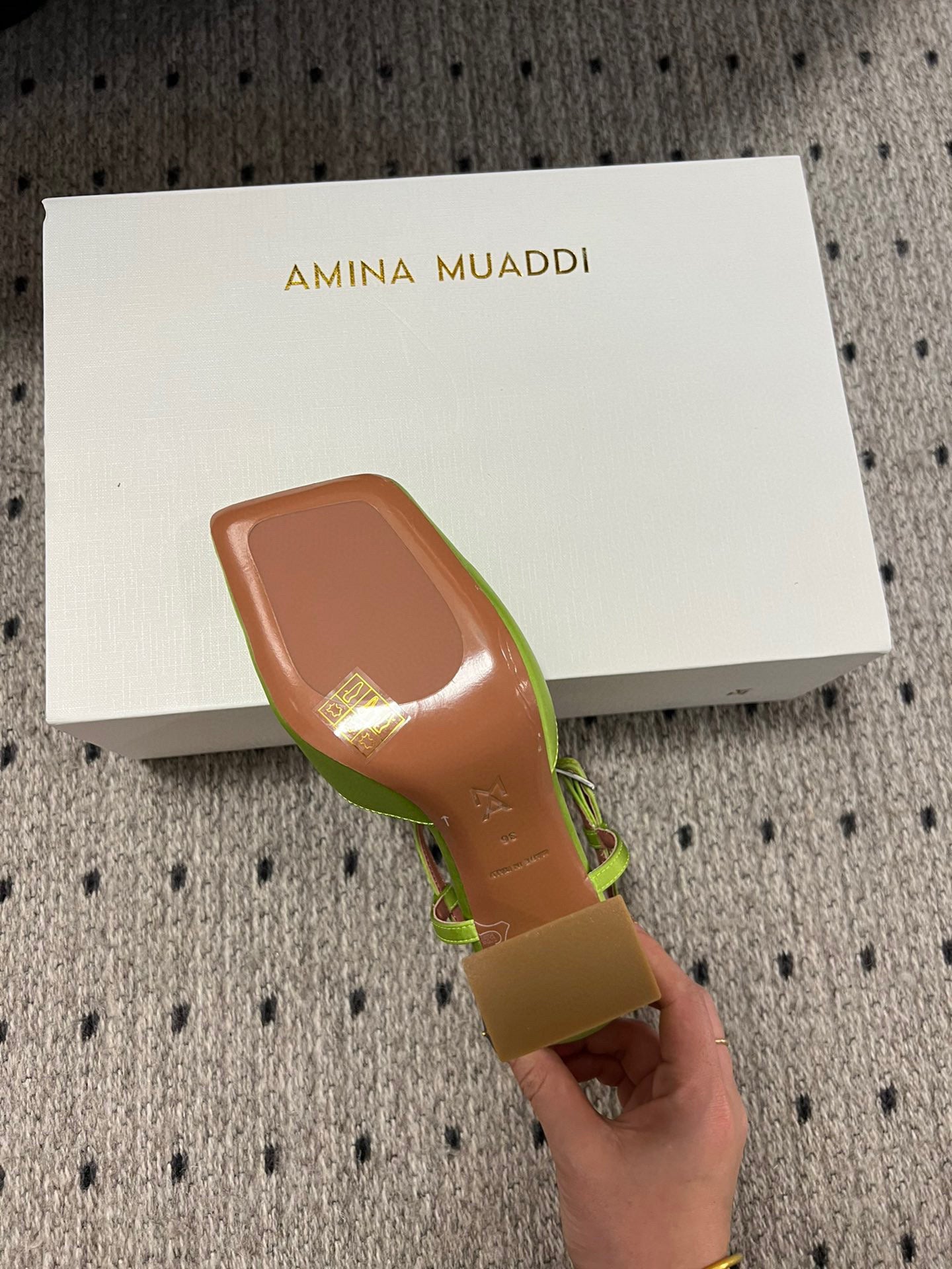 AMINA M HEELS
