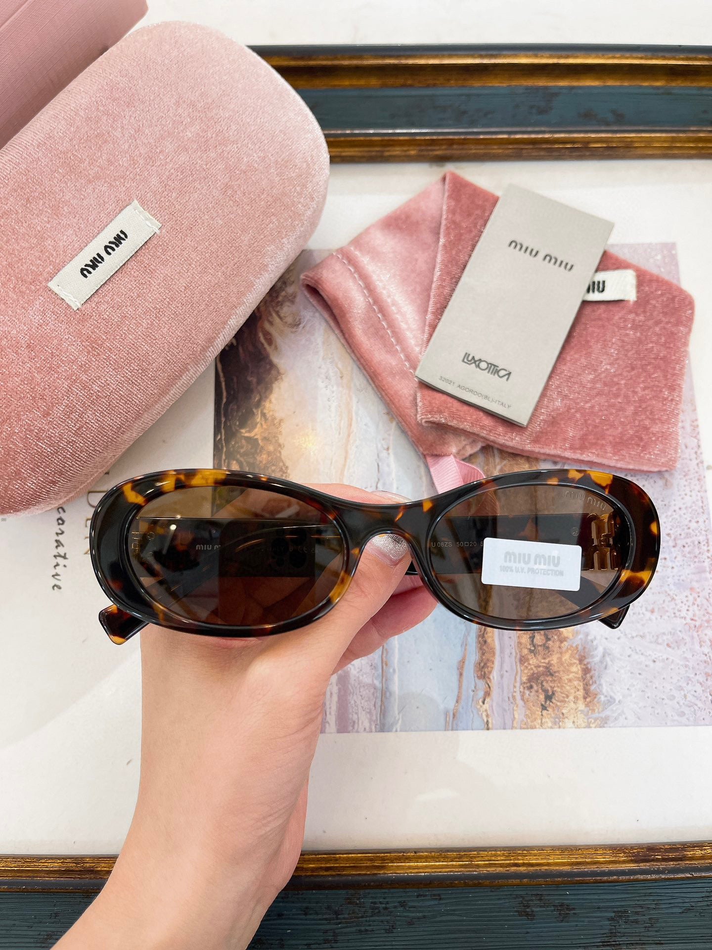 MIU M SUNGLASSES