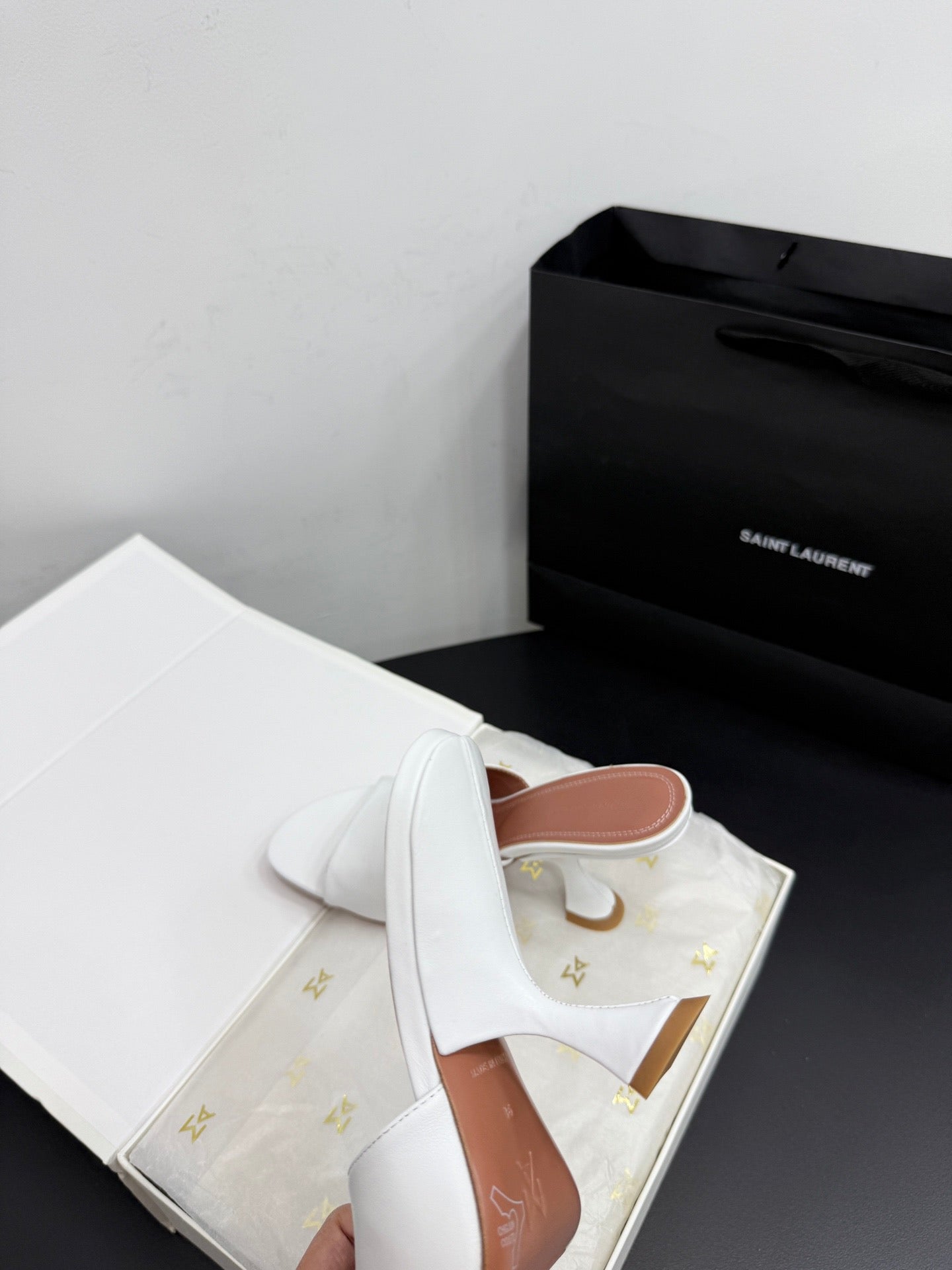 AMINA M HEELS