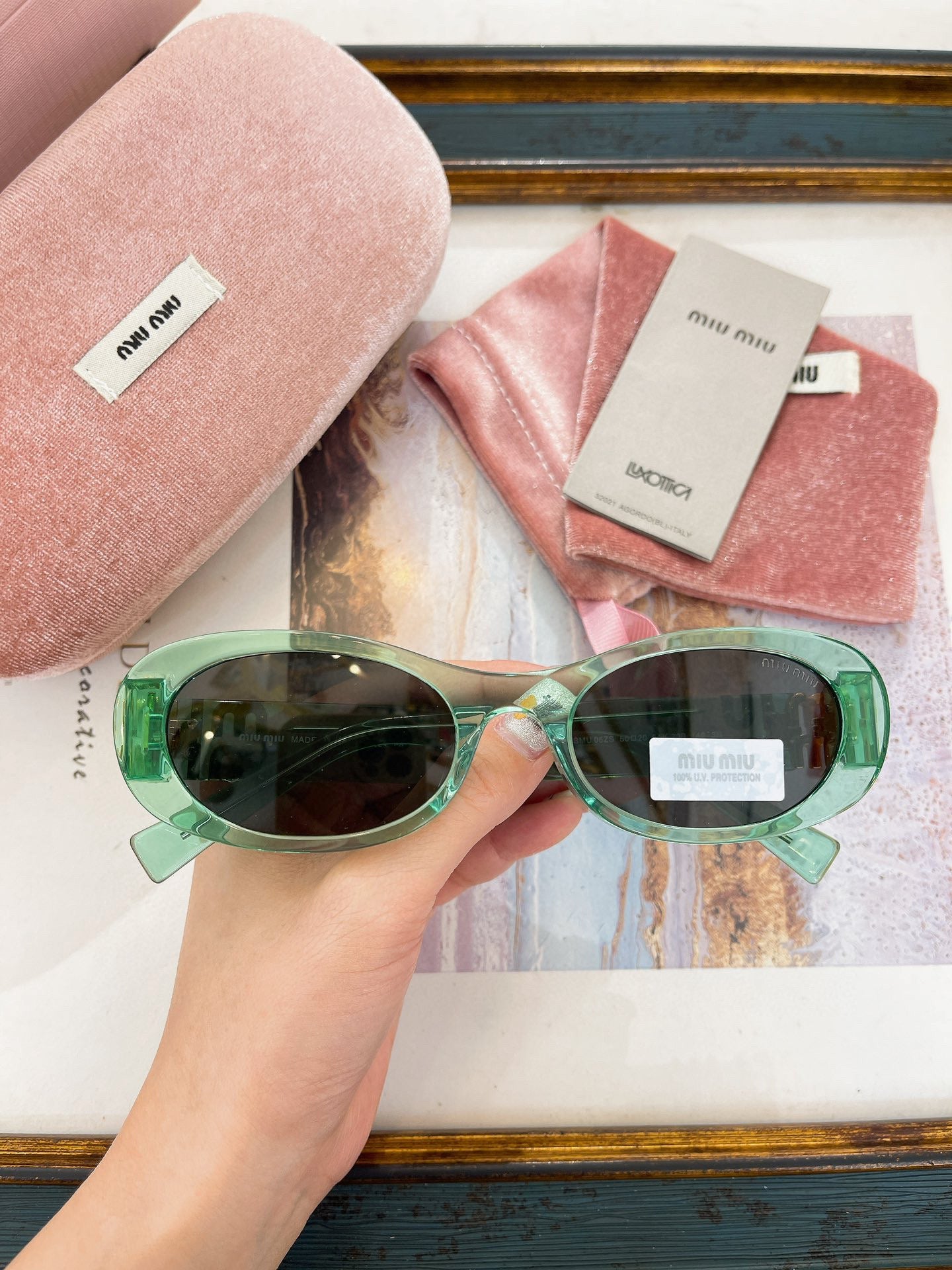MIU M SUNGLASSES