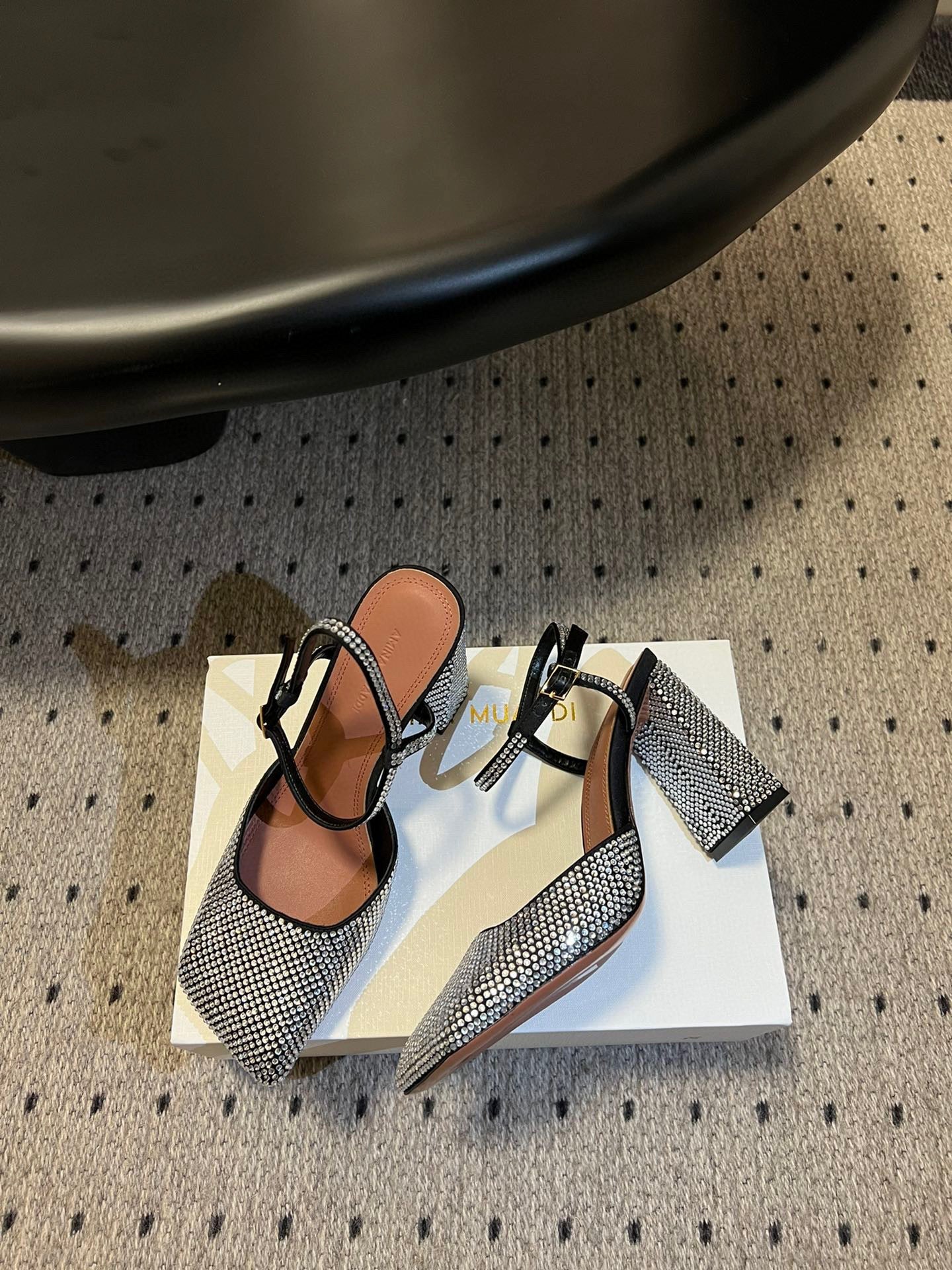 AMINA M HEELS