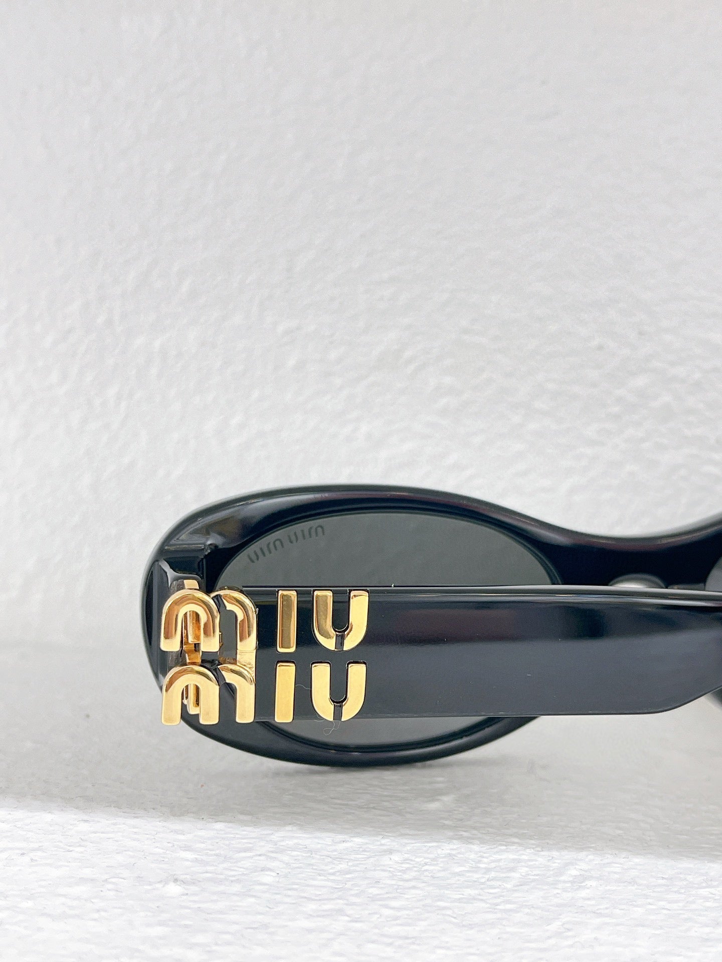 MIU M SUNGLASSES