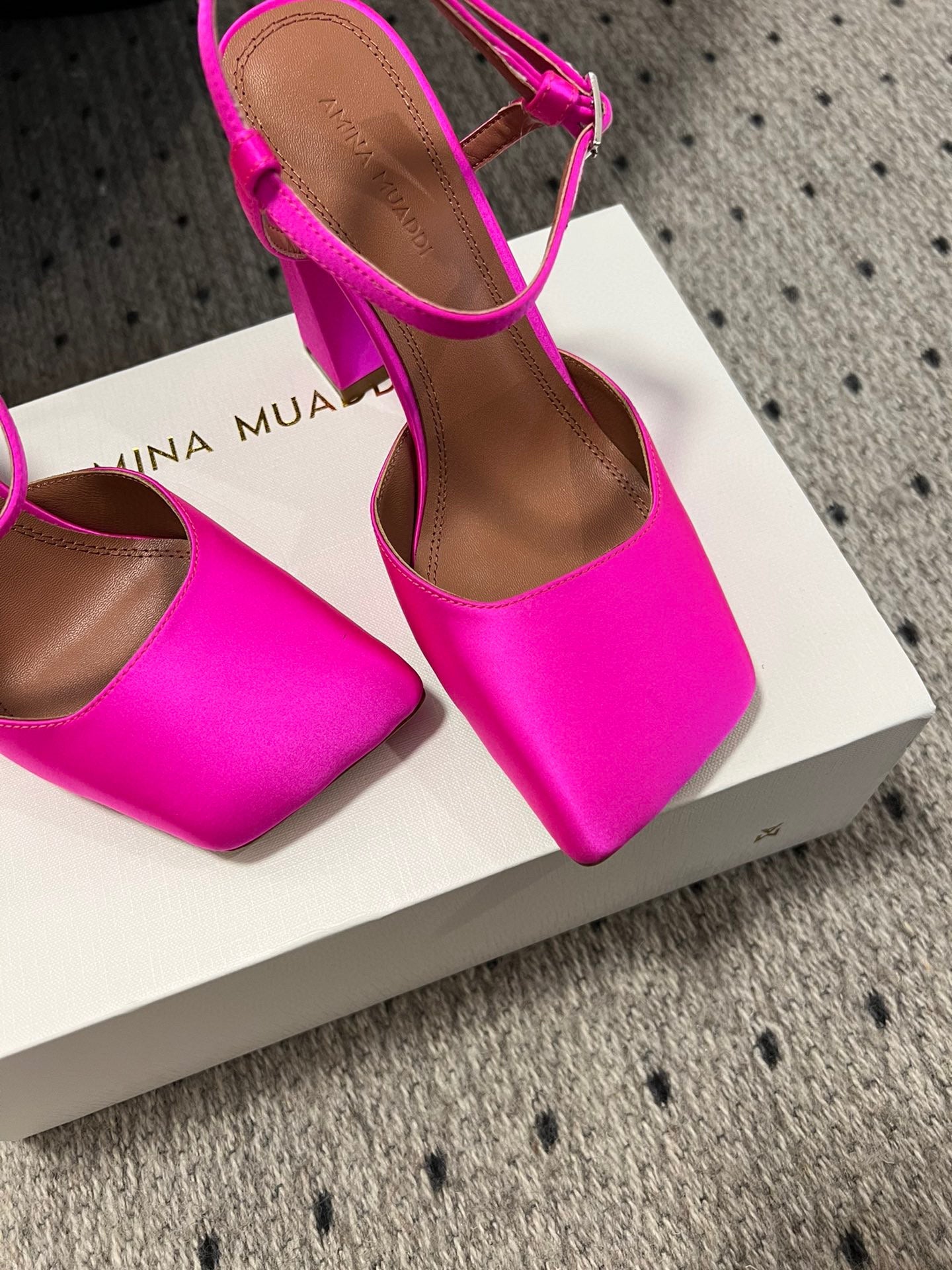 AMINA M HEELS
