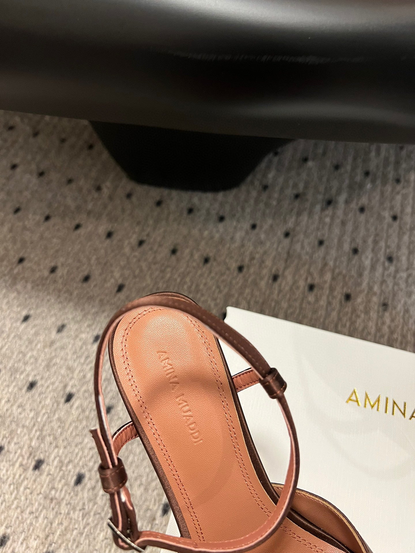 AMINA M HEELS
