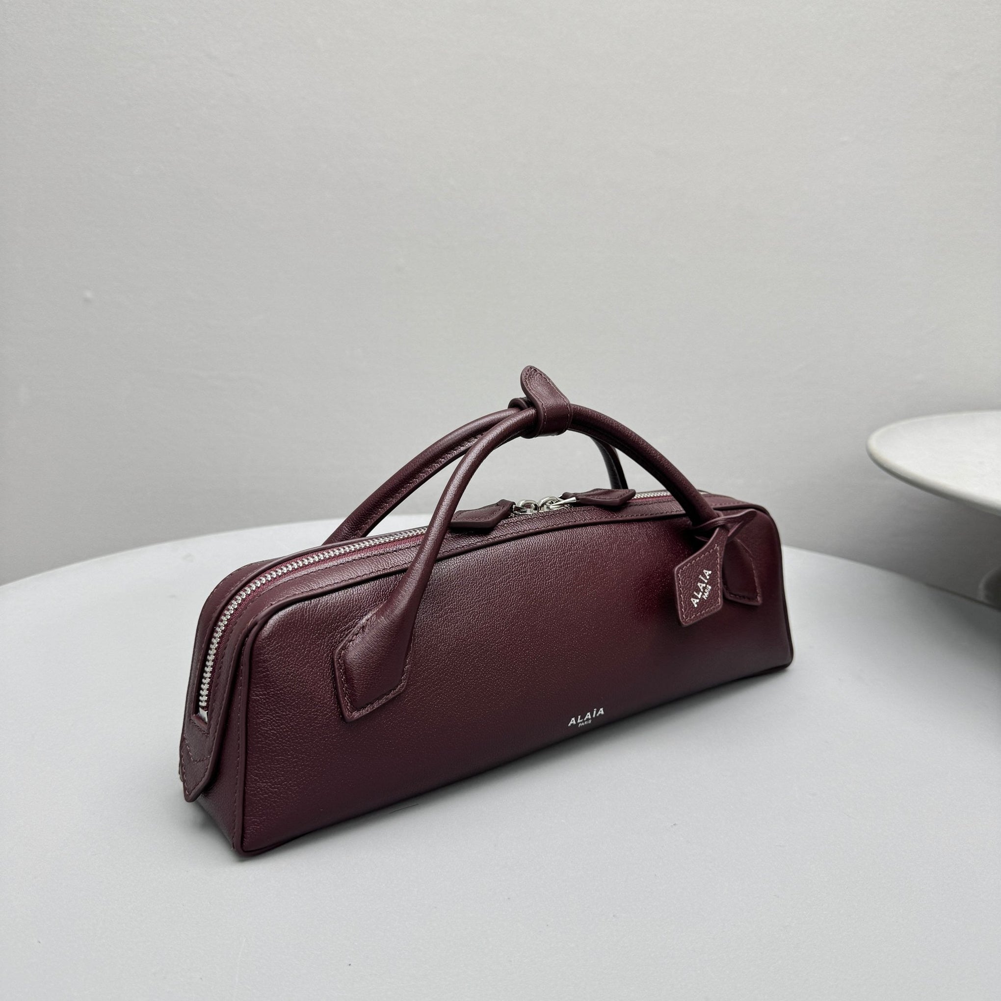 ALAIA LE TECKEL CLUTCH