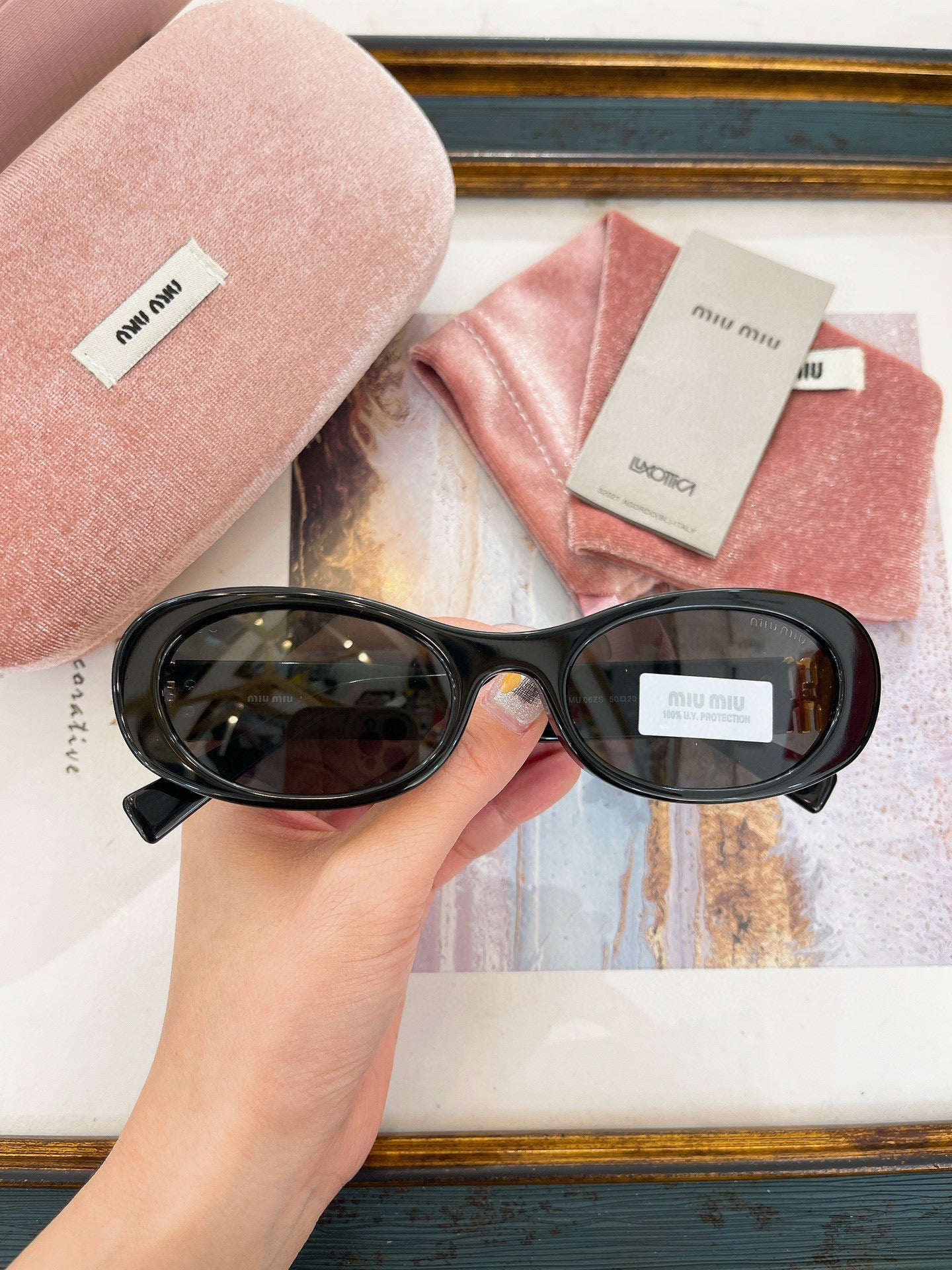 MIU M SUNGLASSES