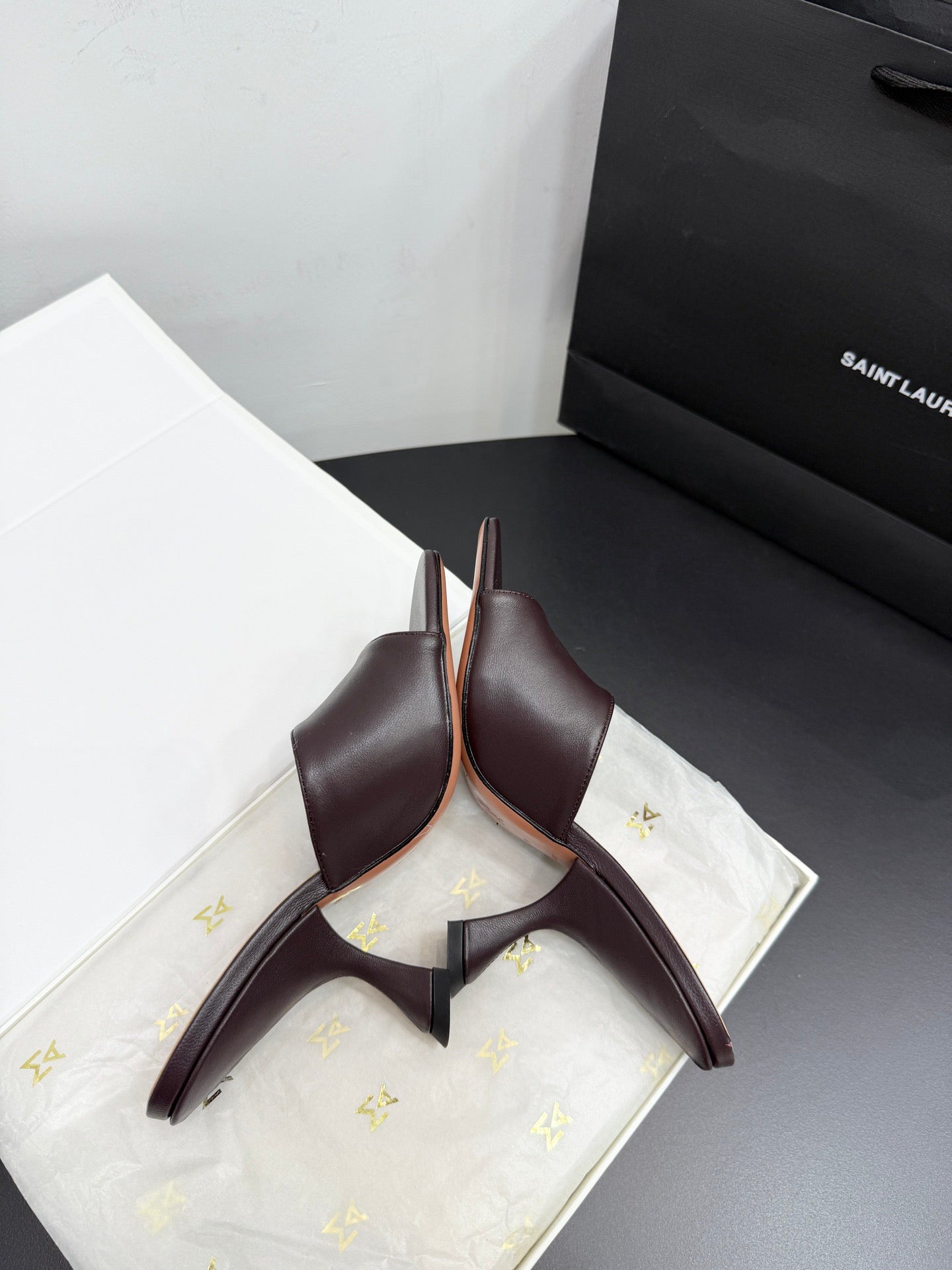 AMINA M HEELS