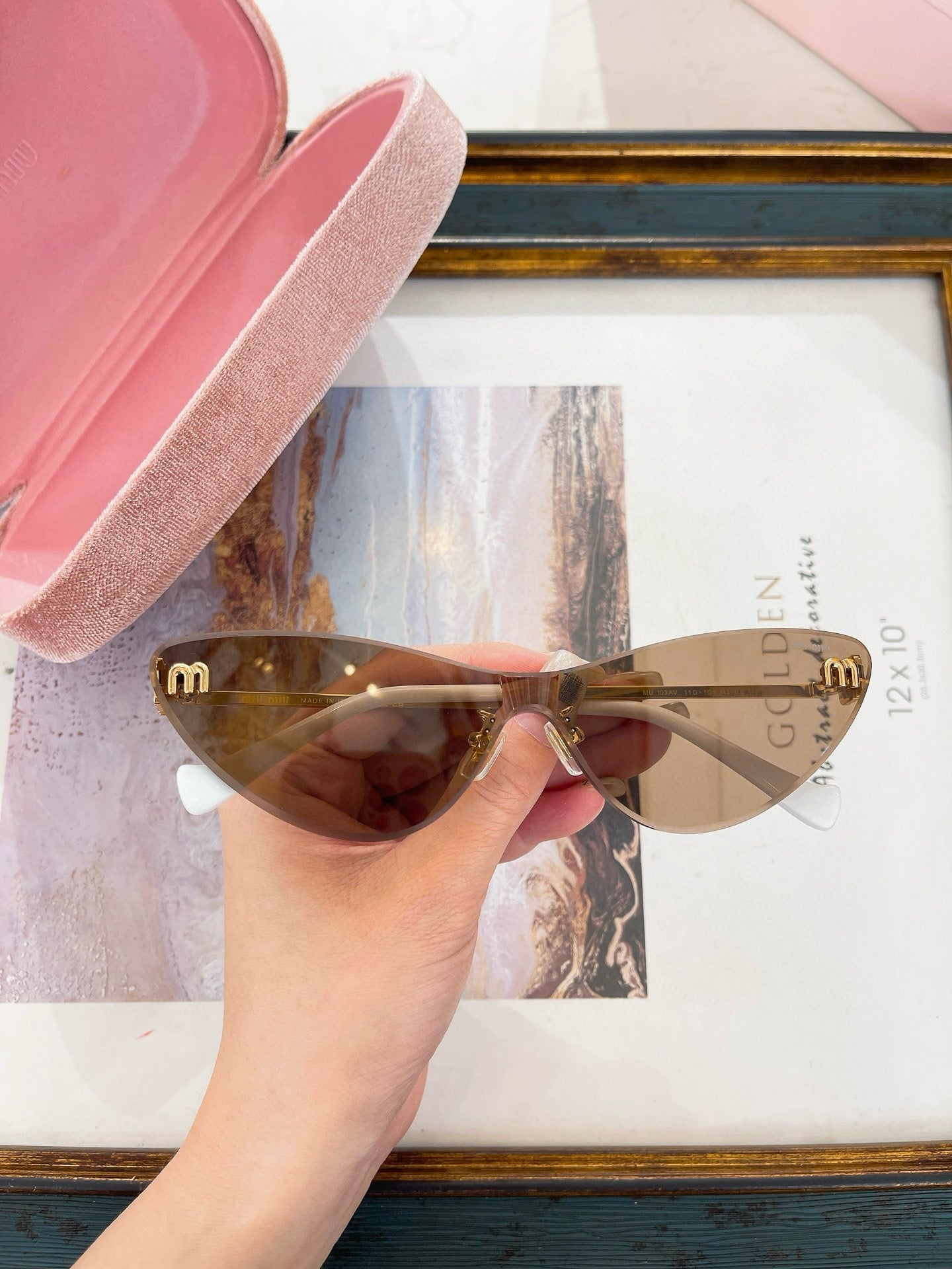 MIU M SUNGLASSES