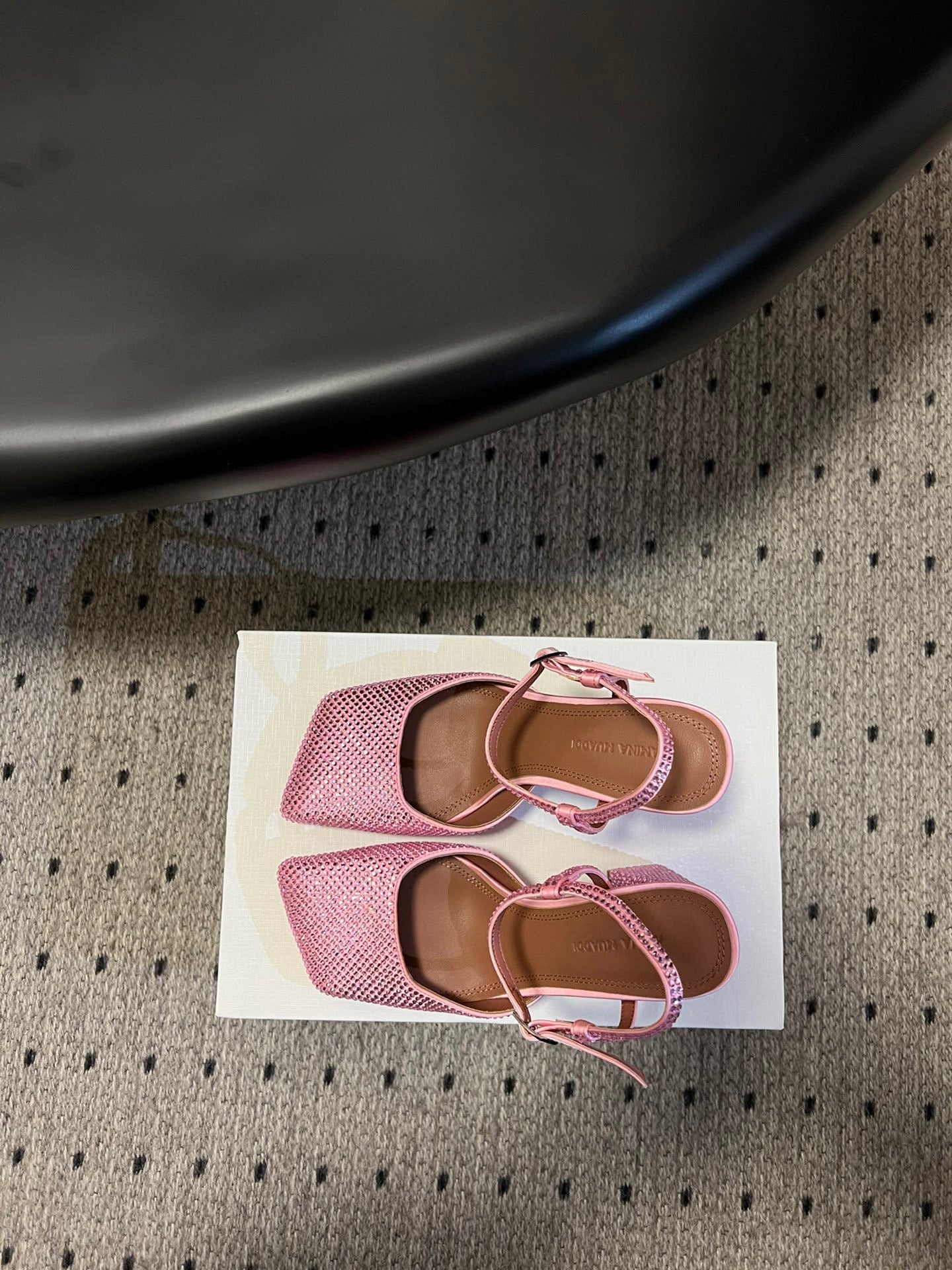 AMINA M HEELS