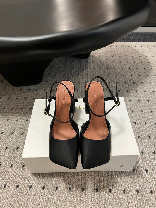 AMINA M HEELS