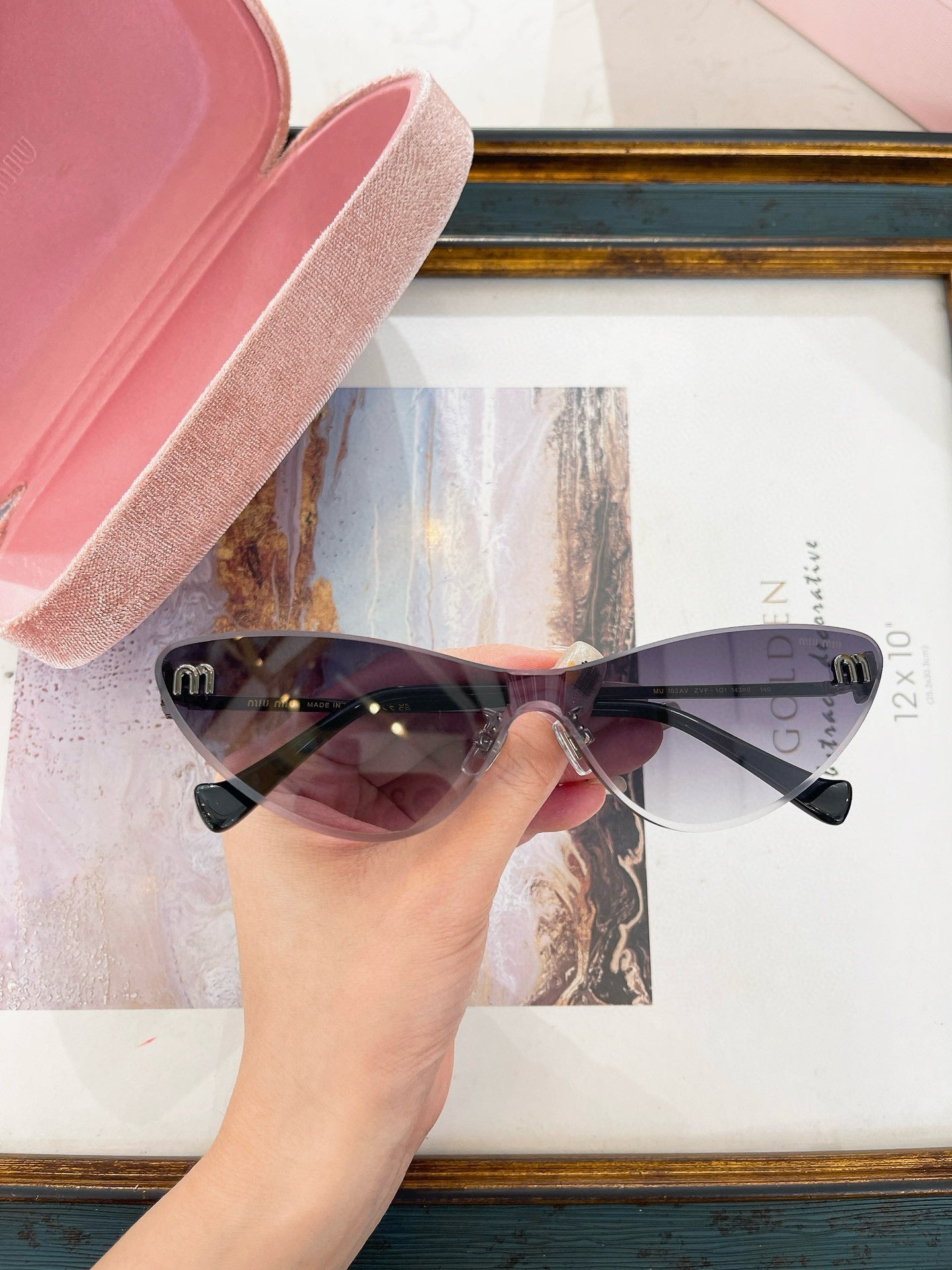 MIU M SUNGLASSES