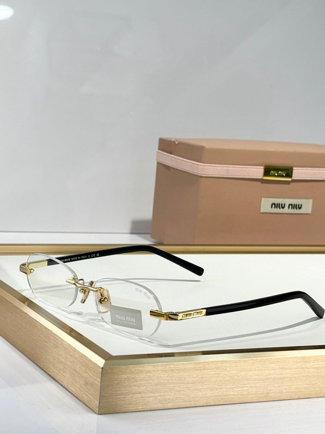 MIU M SUNGLASSES