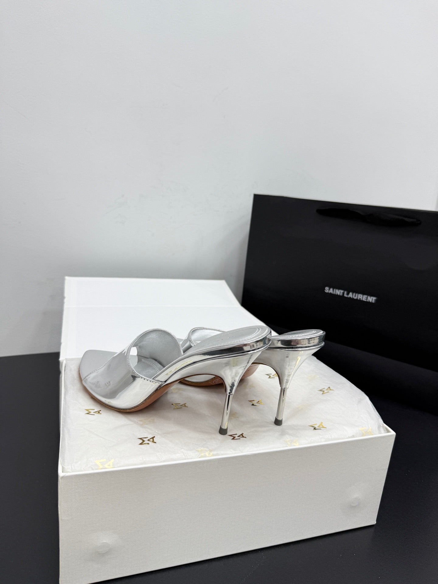 AMINA M HEELS