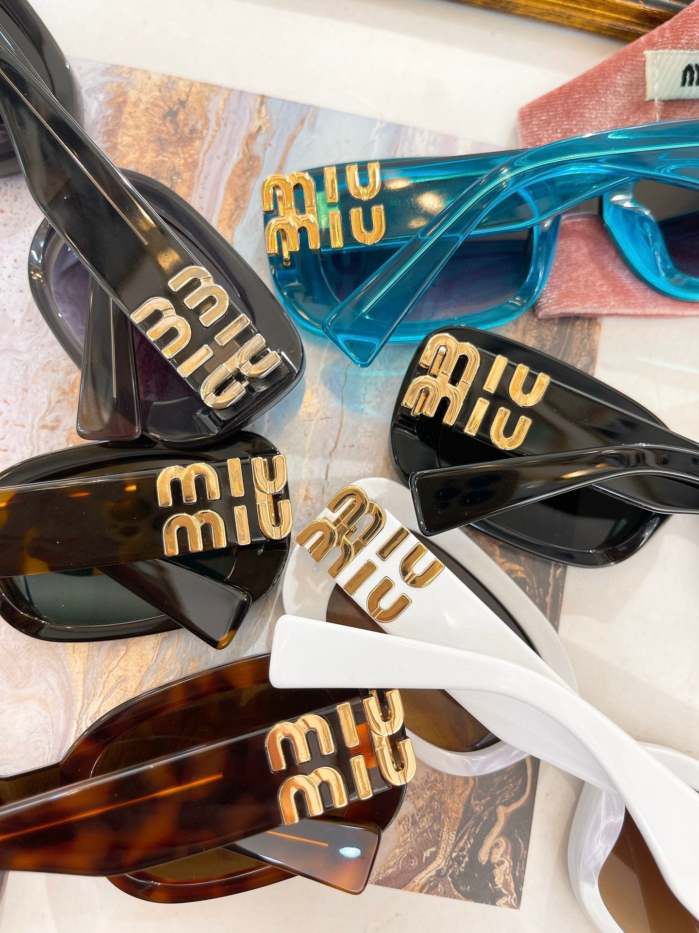 MIU M SUNGLASSES