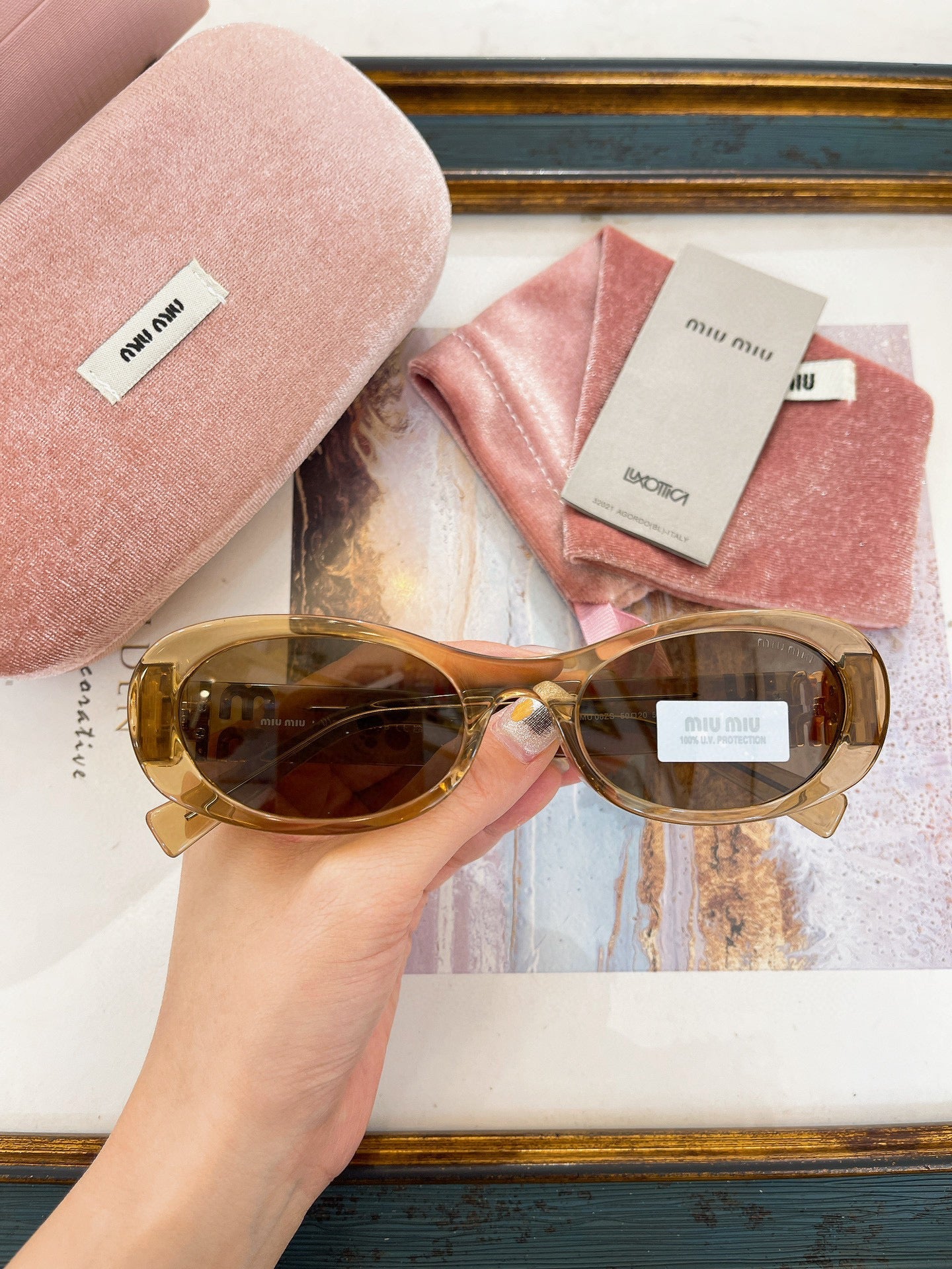 MIU M SUNGLASSES