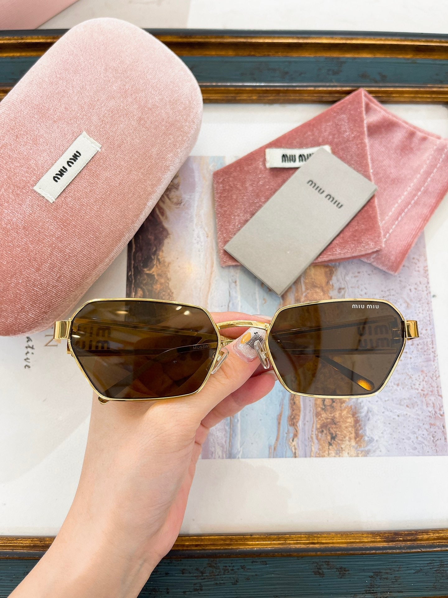 MIU M SUNGLASSES
