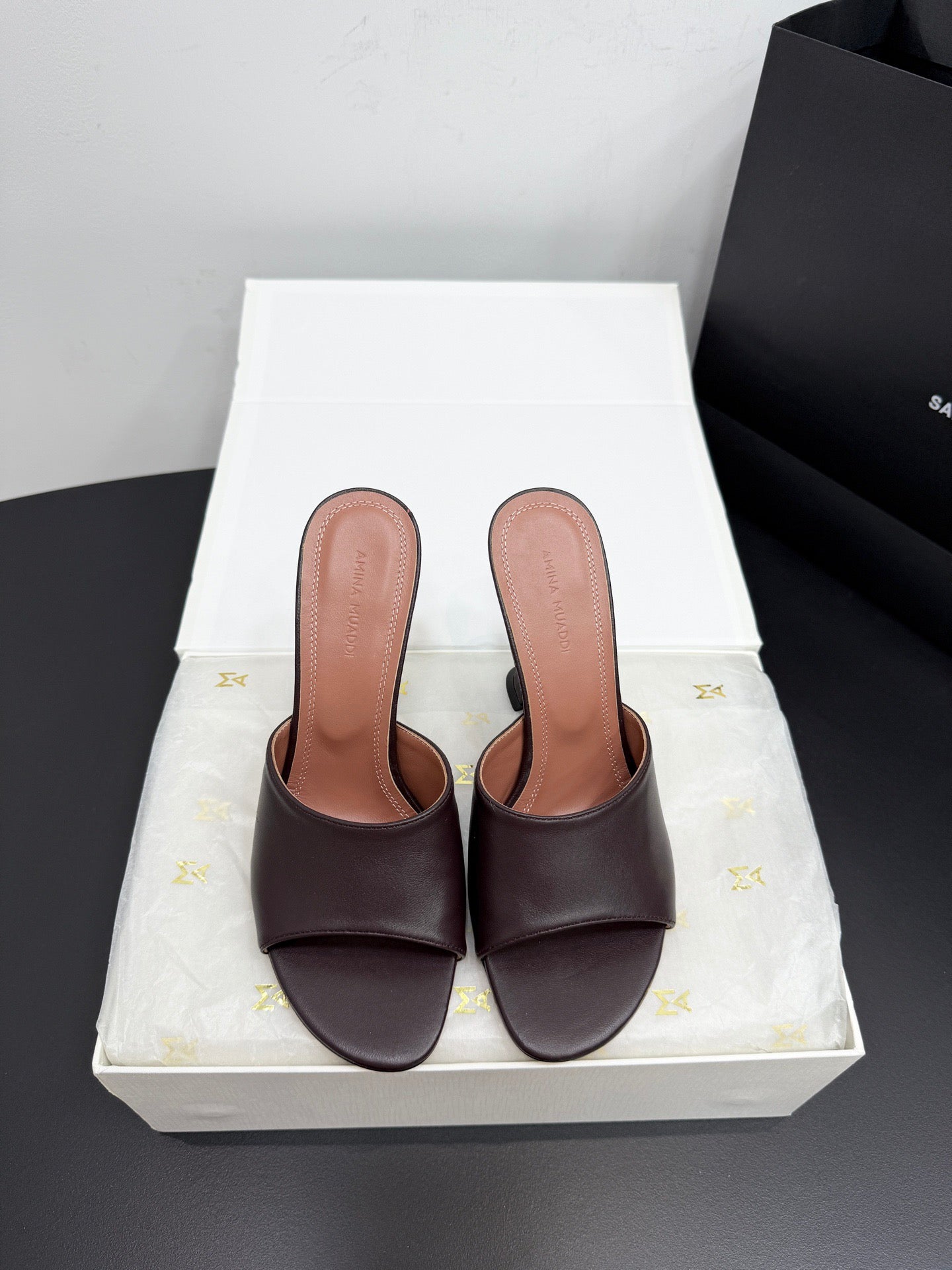 AMINA M HEELS