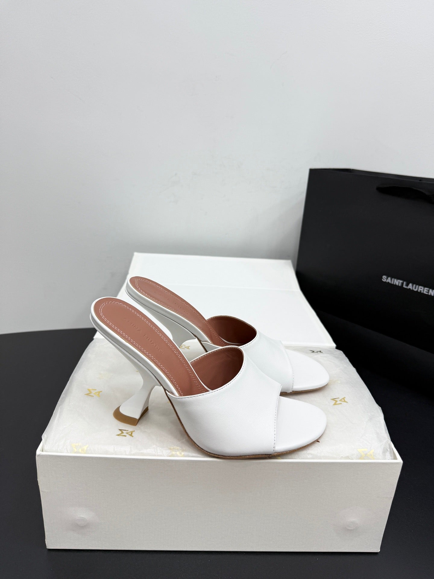 AMINA M HEELS
