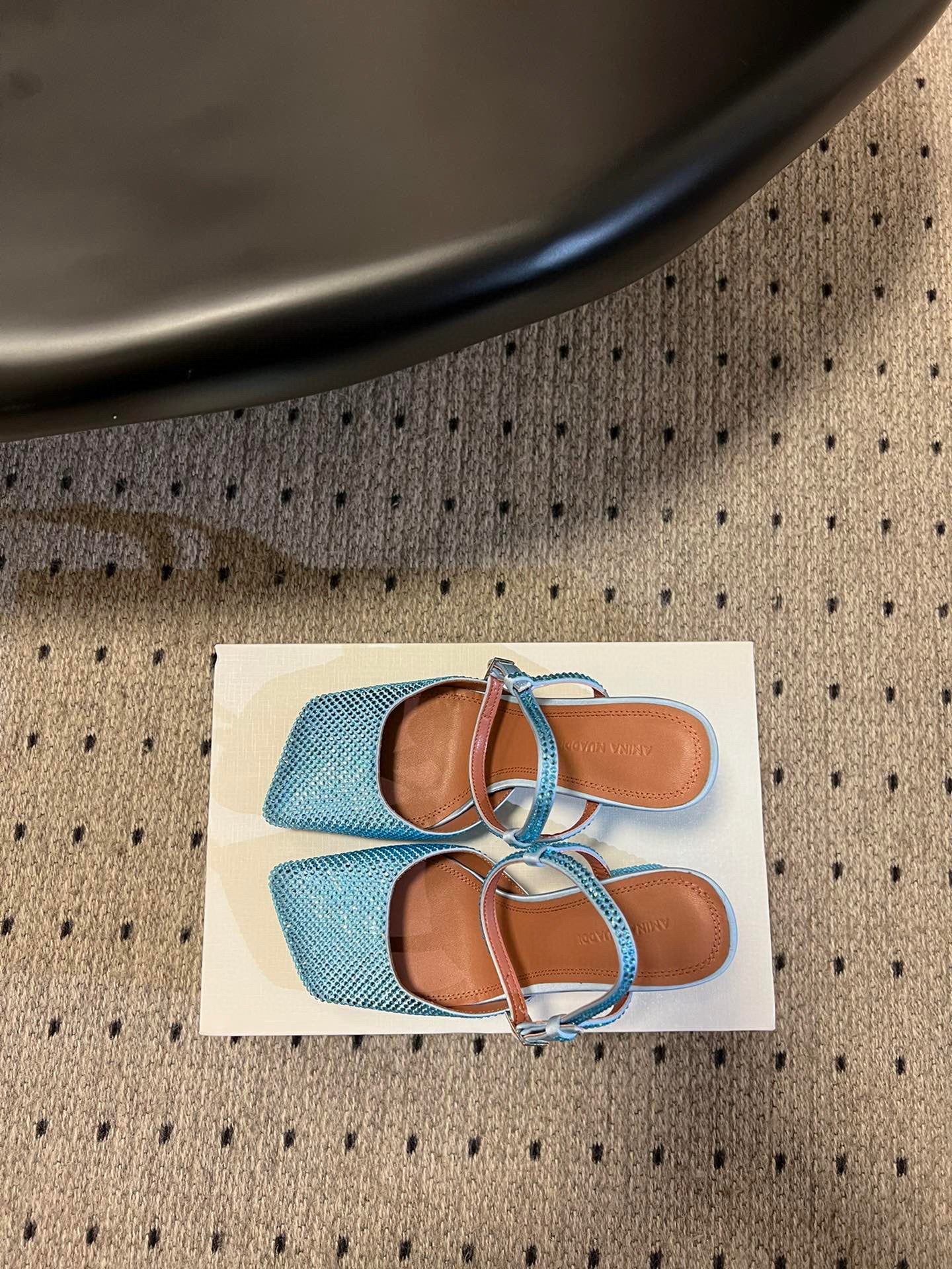 AMINA M HEELS