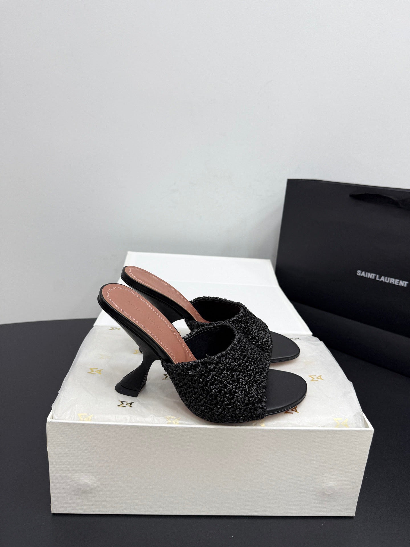 AMINA M HEELS