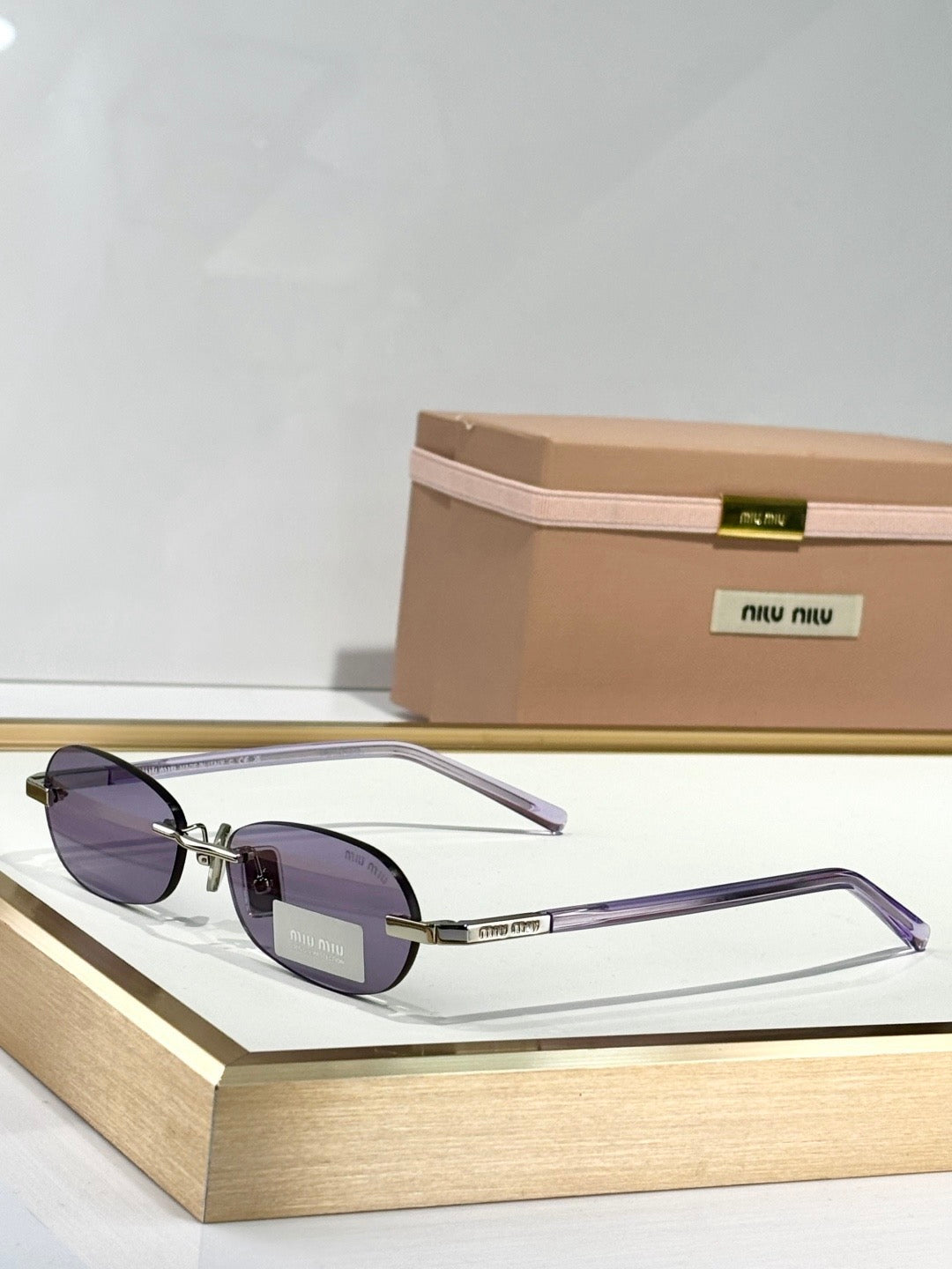 MIU M SUNGLASSES