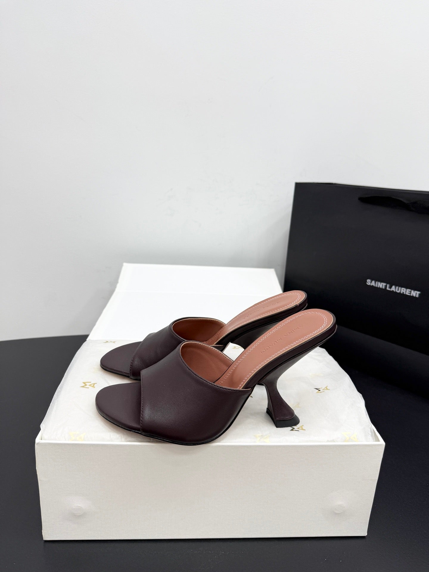 AMINA M HEELS