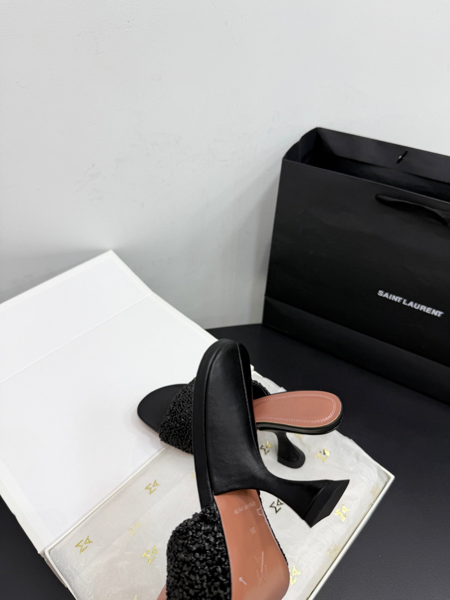 AMINA M HEELS