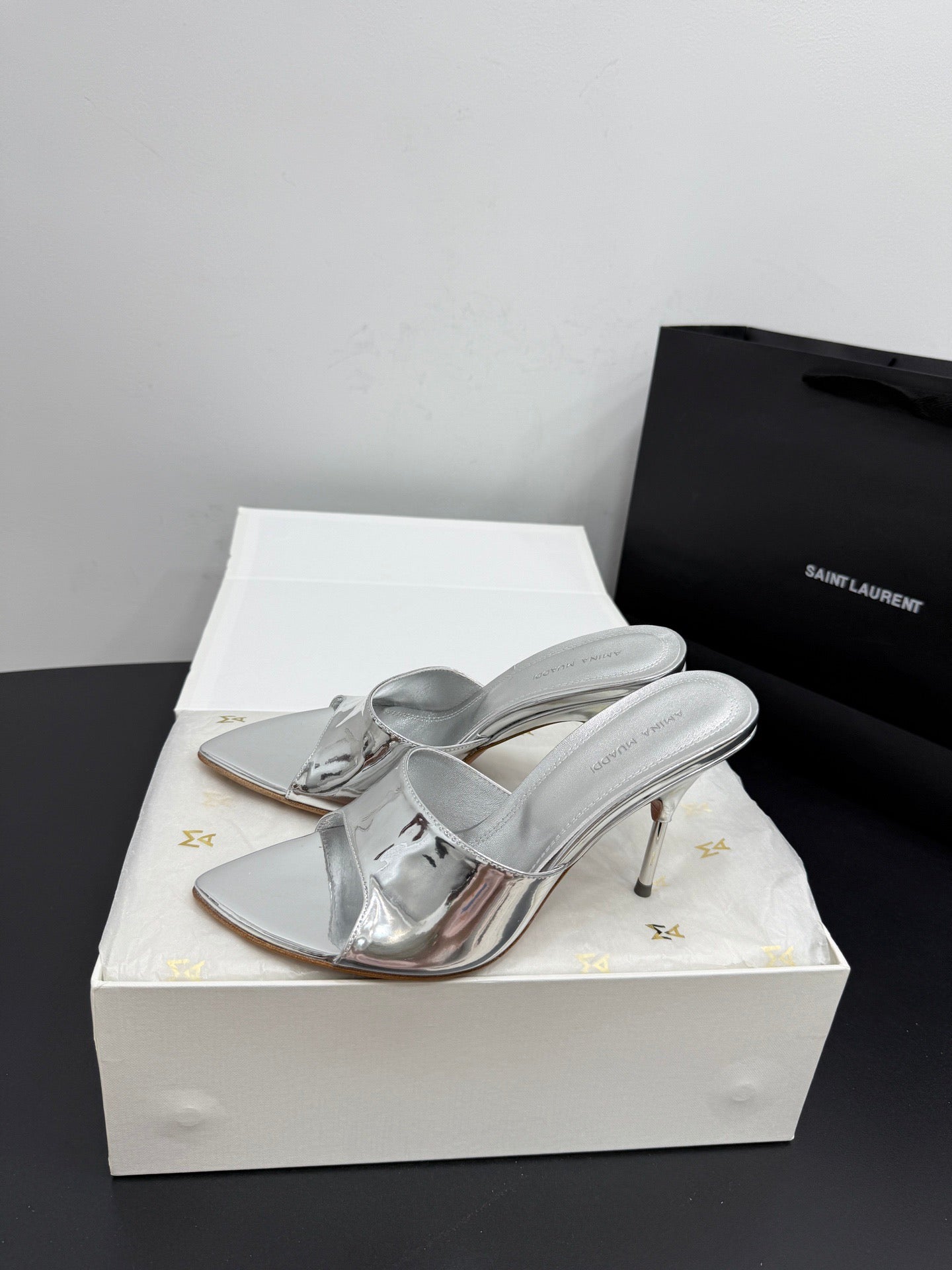 AMINA M HEELS