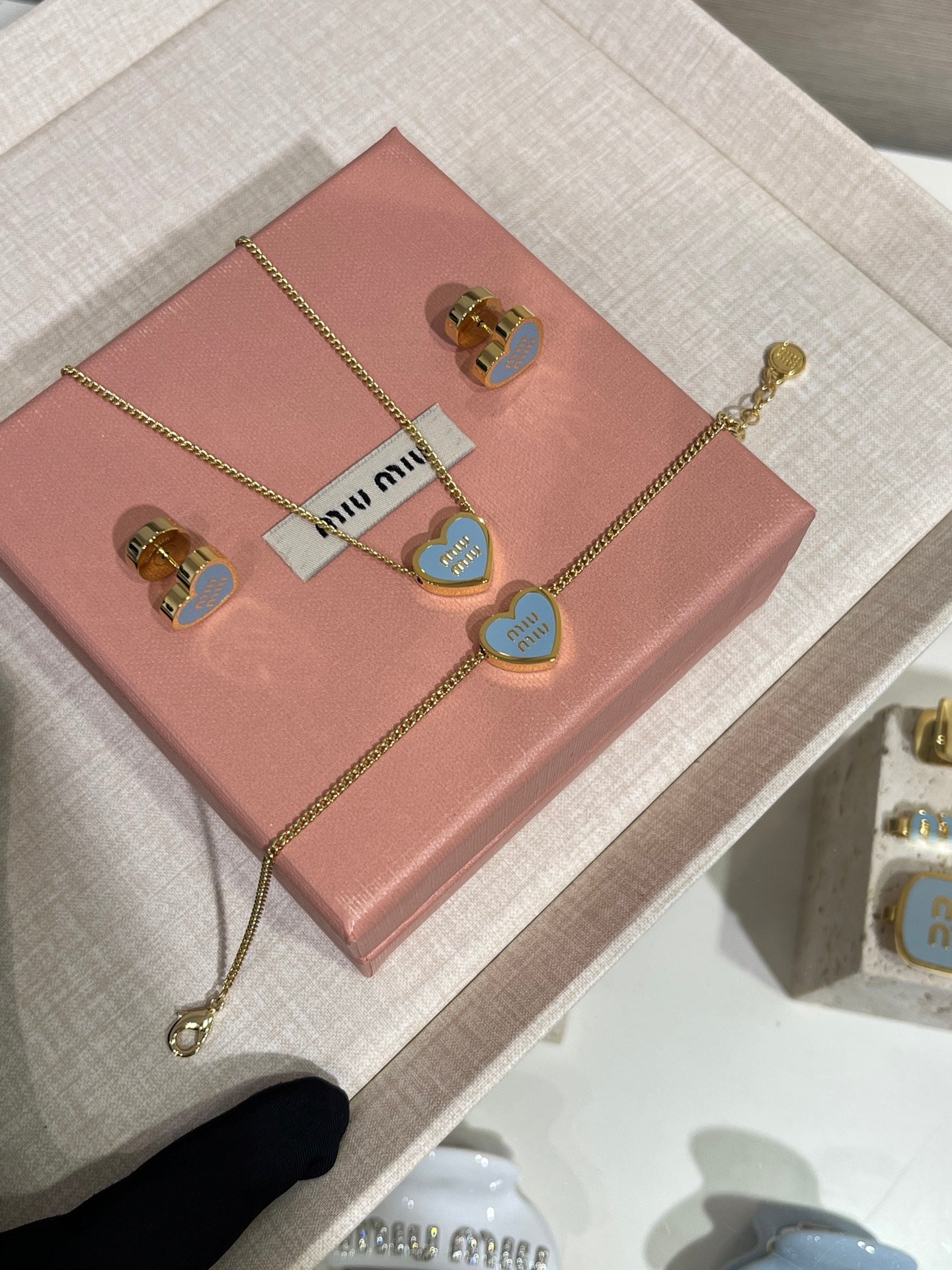 MIU M EARRINGS