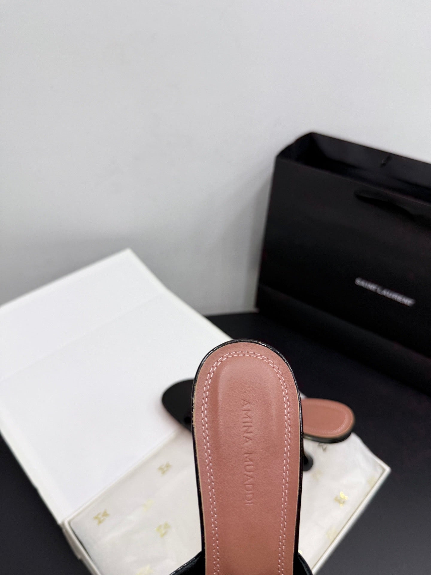 AMINA M HEELS