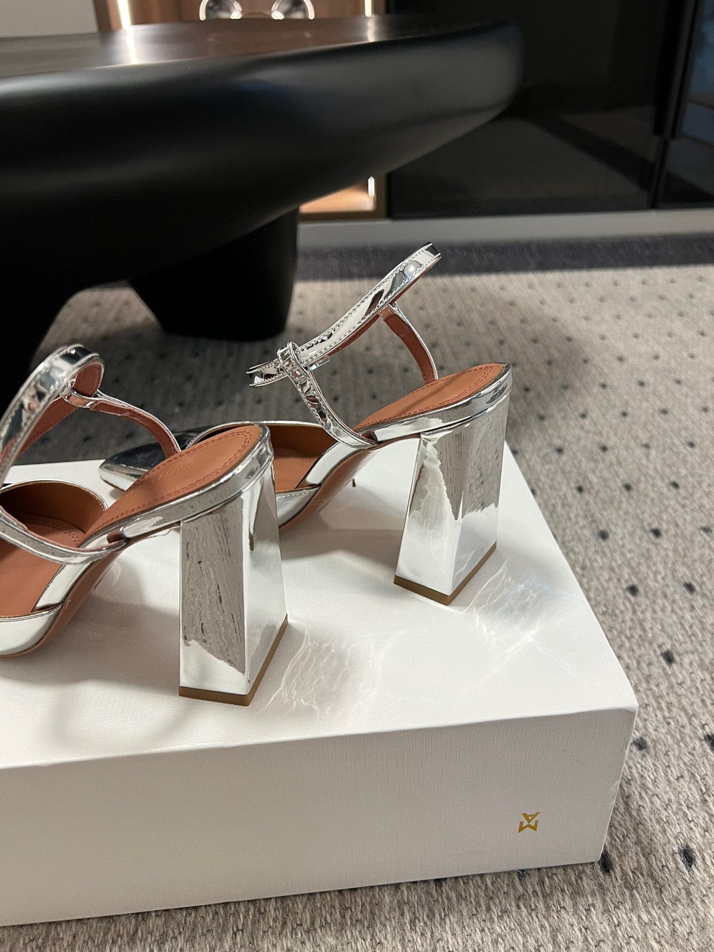 AMINA M HEELS