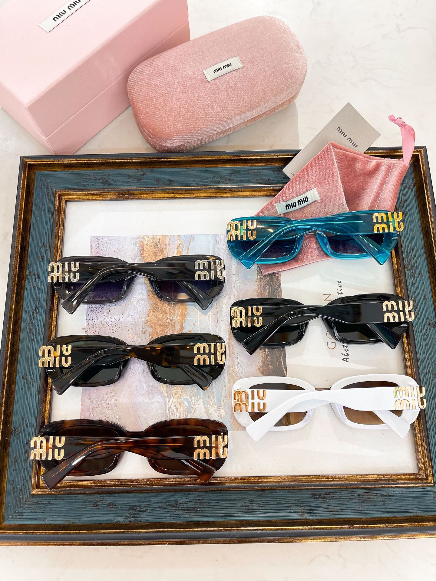 MIU M SUNGLASSES