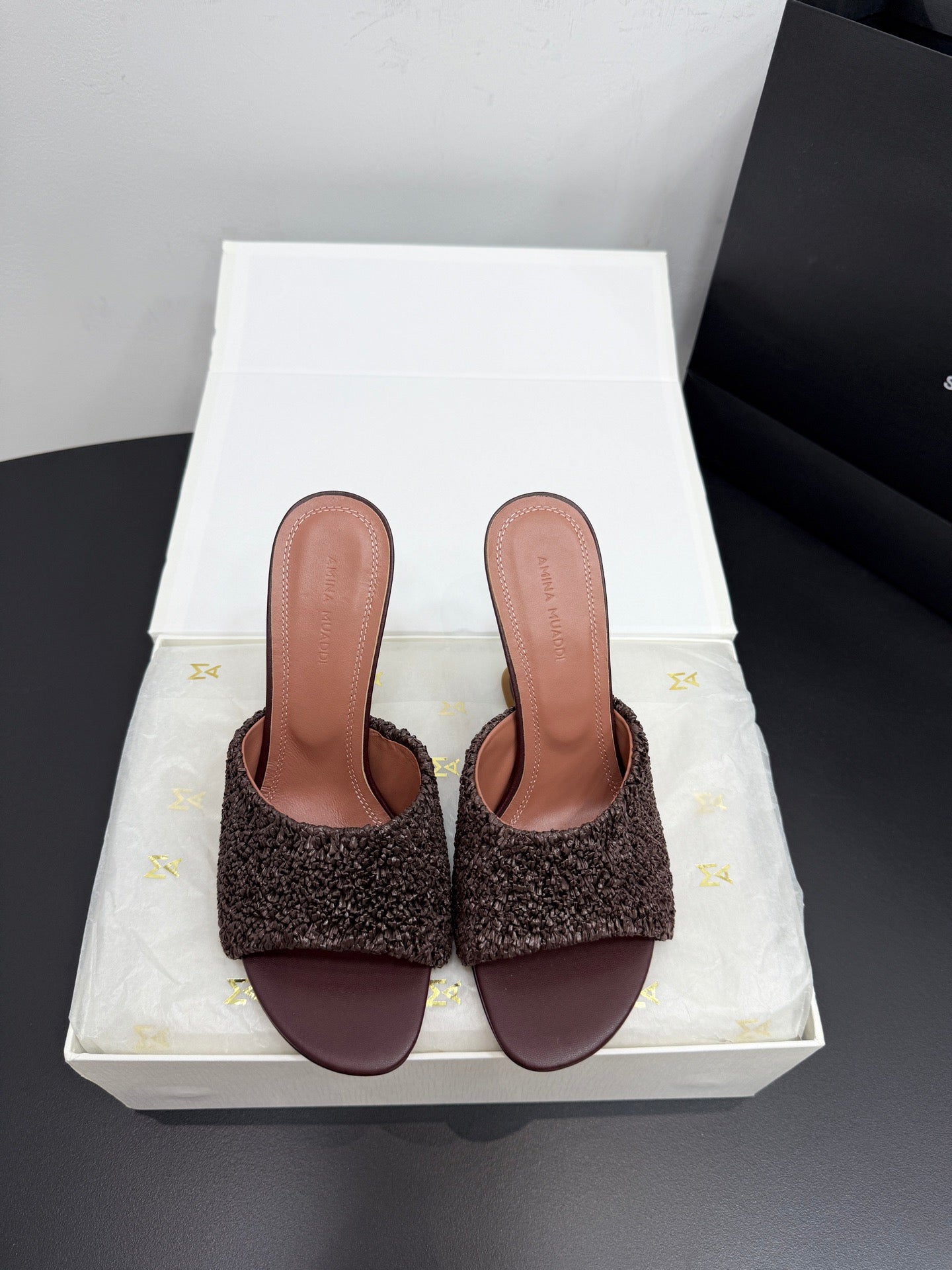 AMINA M HEELS