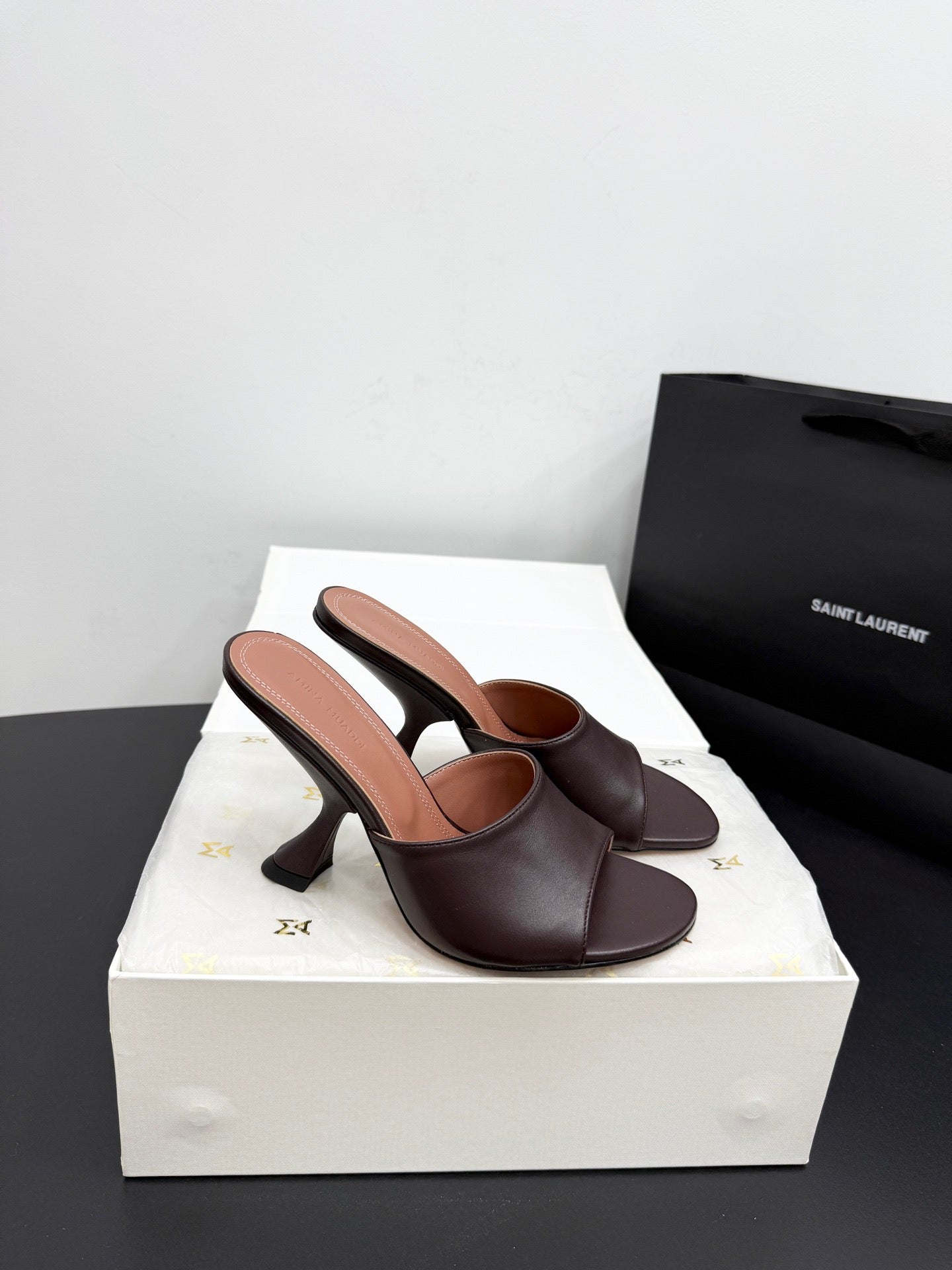 AMINA M HEELS