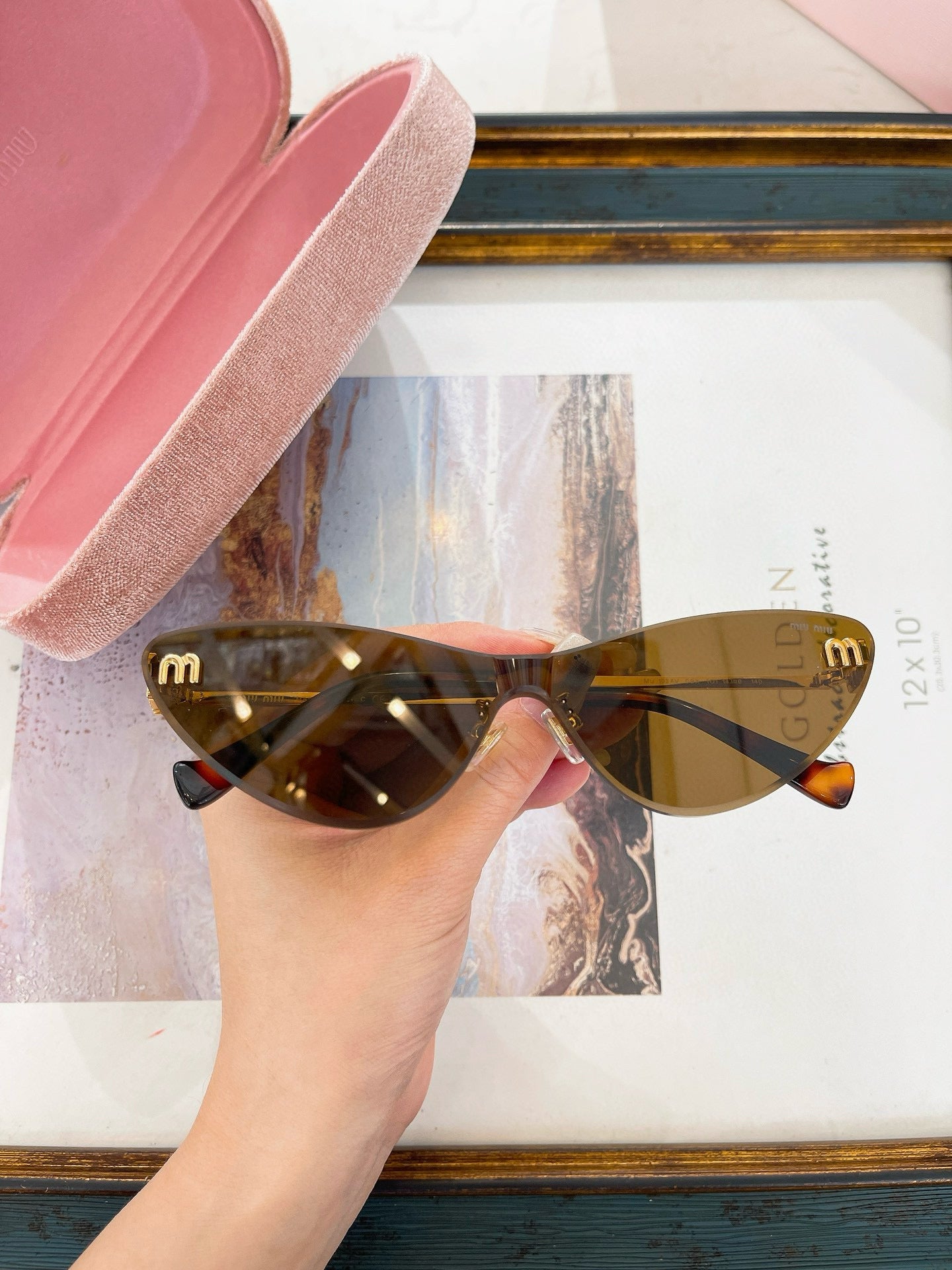MIU M SUNGLASSES