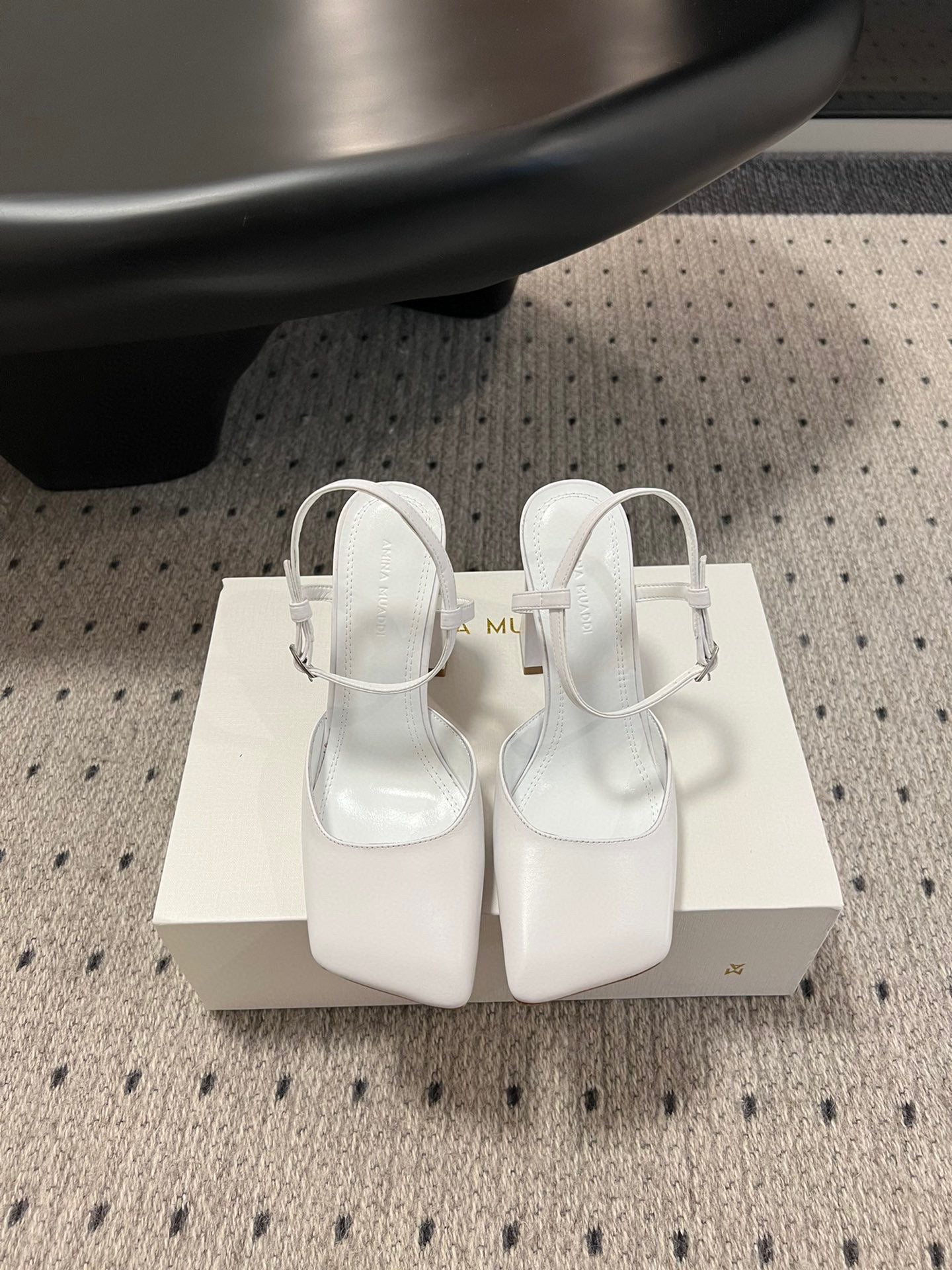 AMINA M HEELS