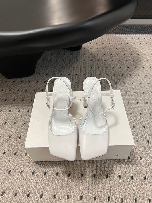 AMINA M HEELS