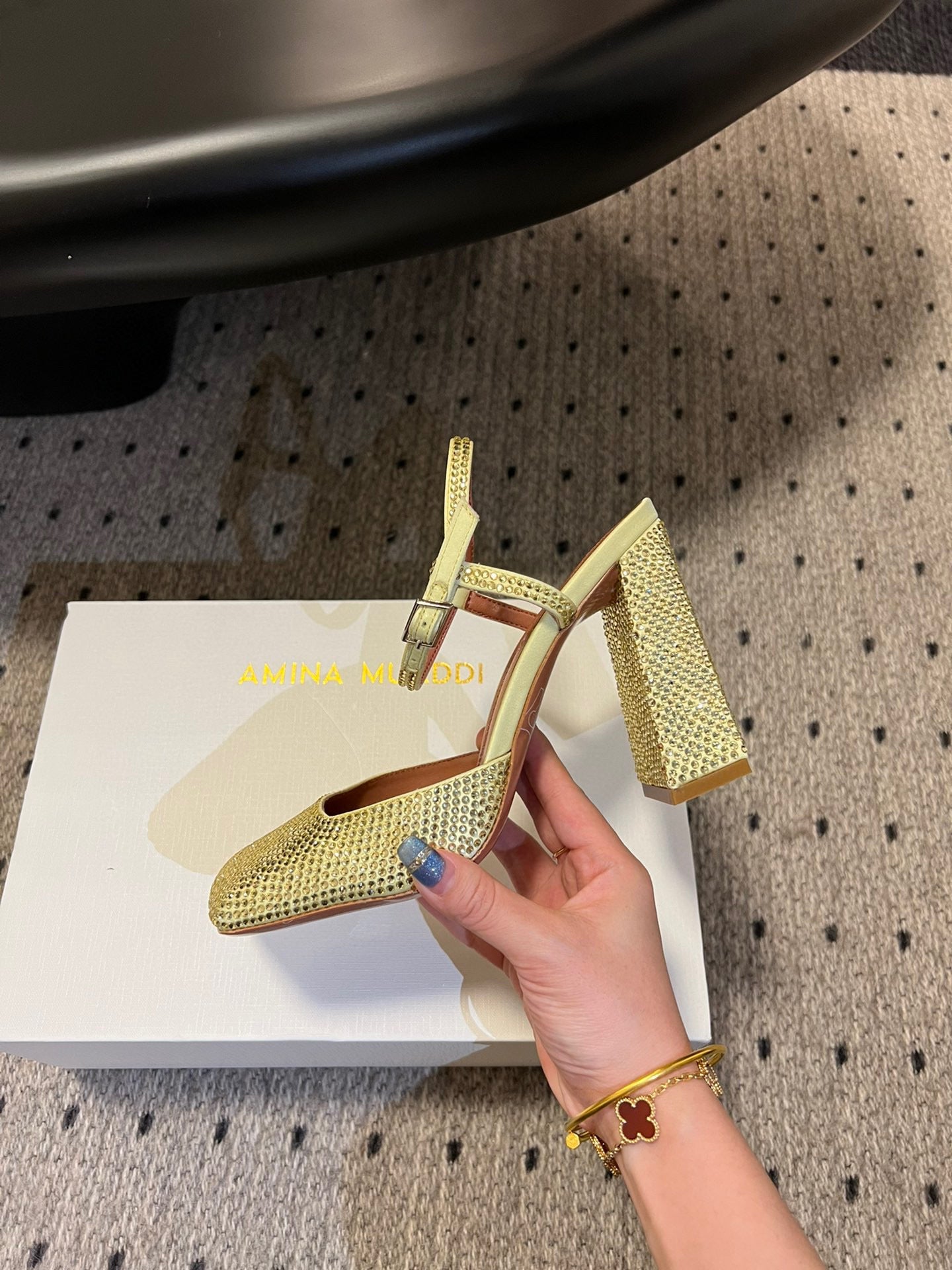 AMINA M HEELS