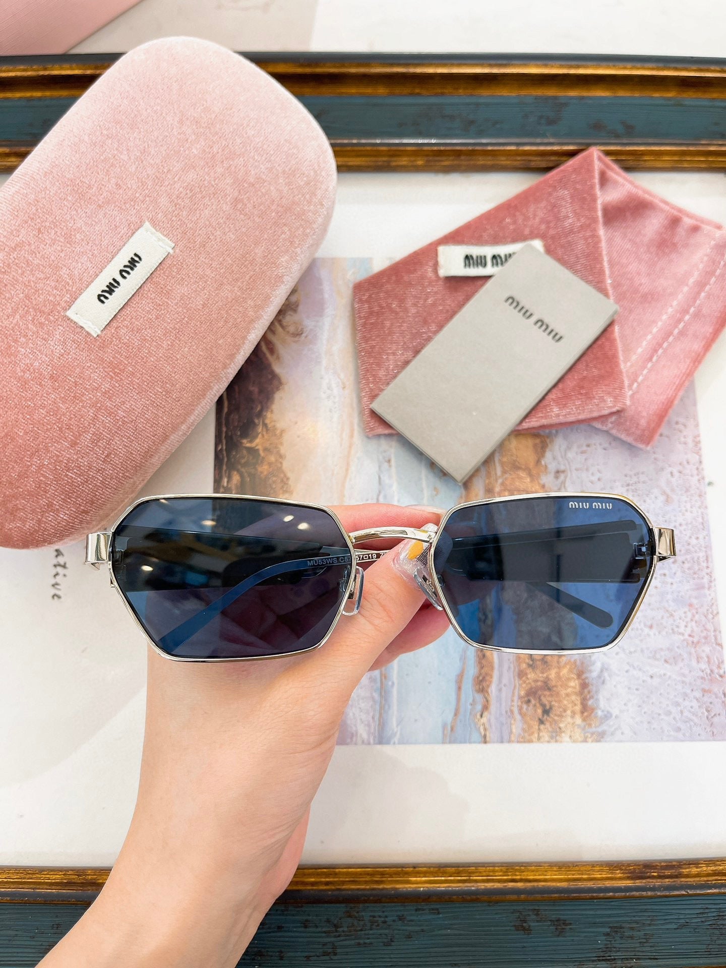 MIU M SUNGLASSES