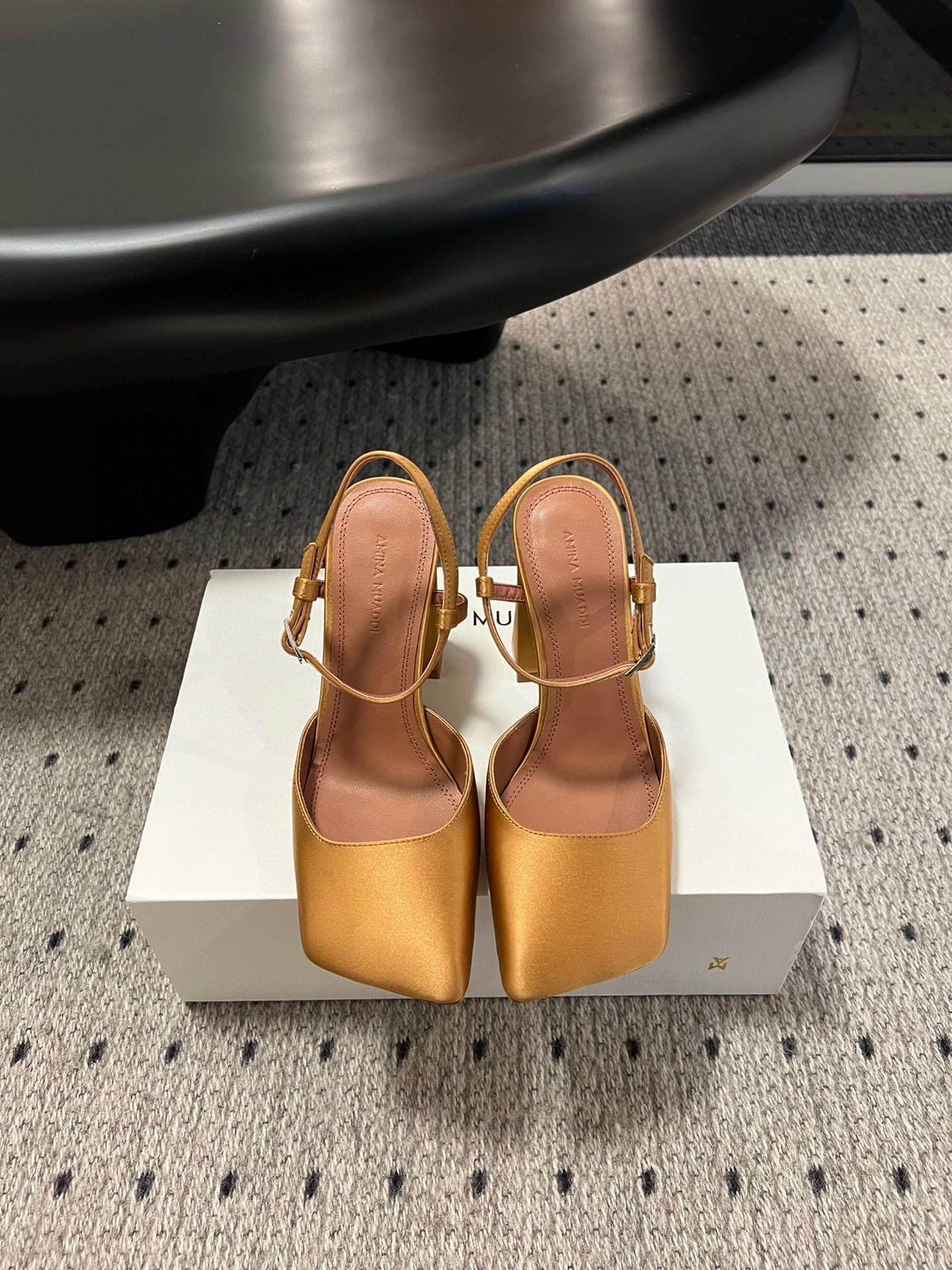 AMINA M HEELS