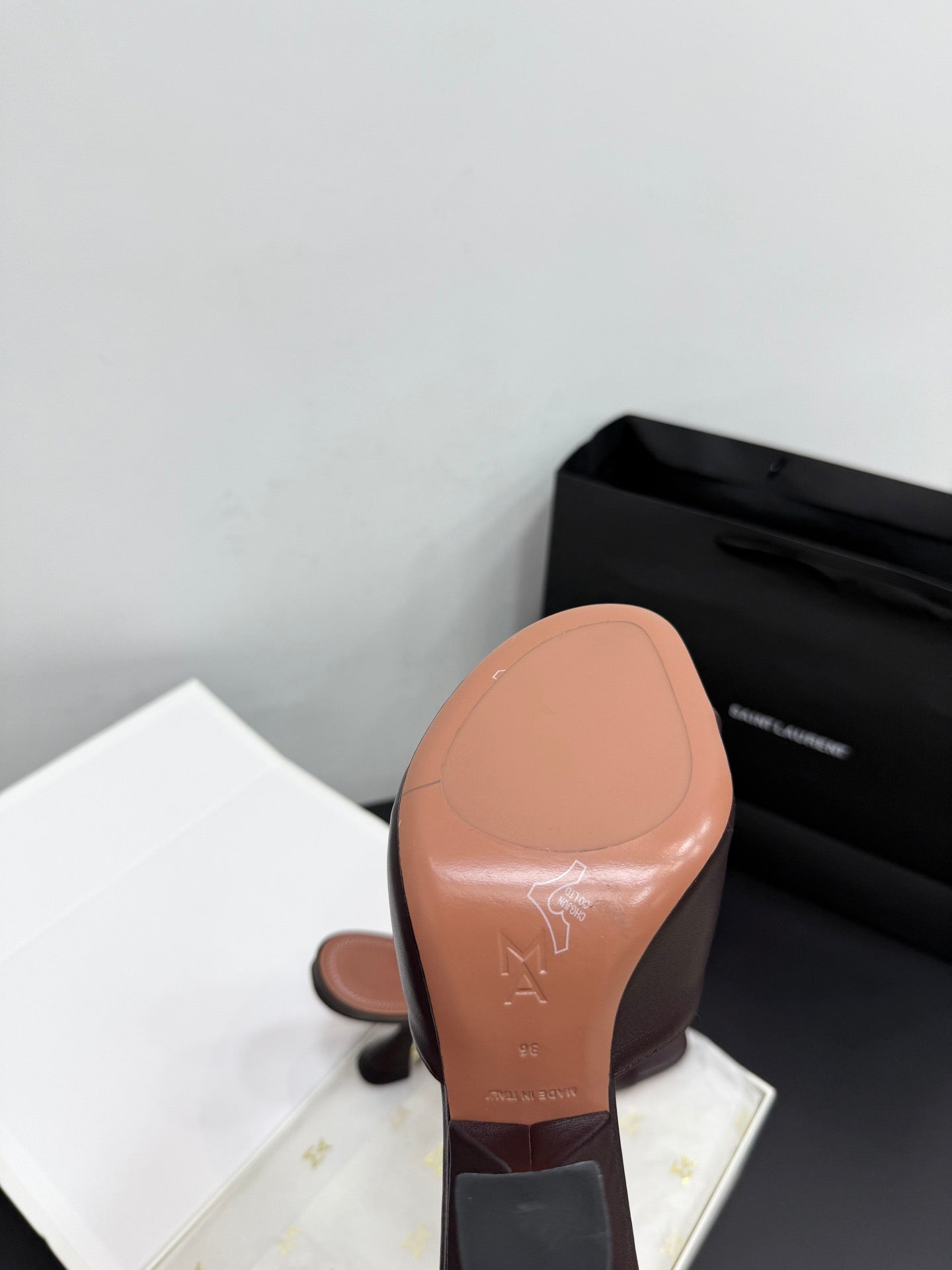 AMINA M HEELS