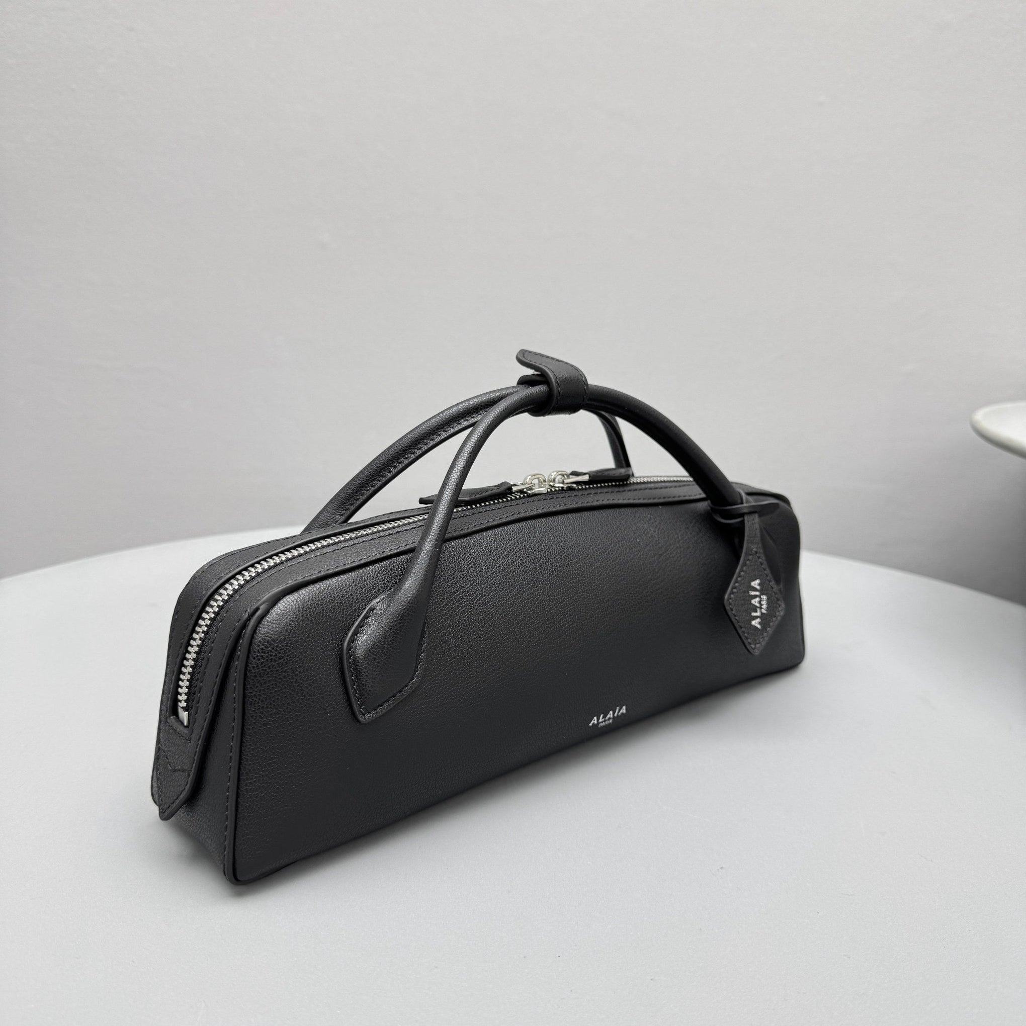 ALAIA LE TECKEL CLUTCH