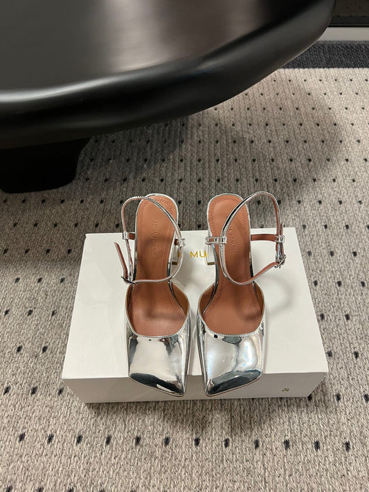 AMINA M HEELS