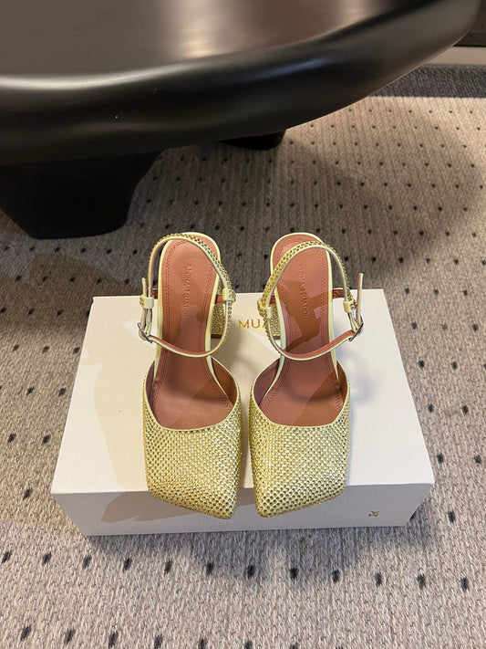AMINA M HEELS