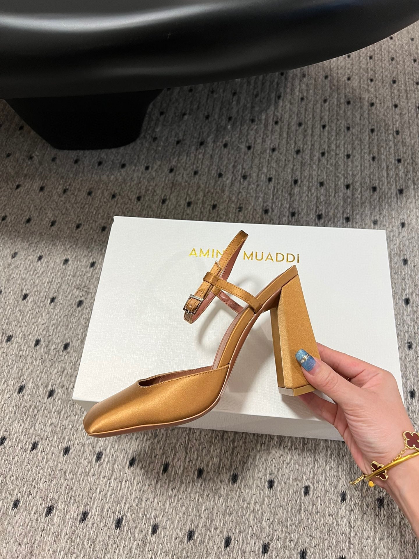 AMINA M HEELS