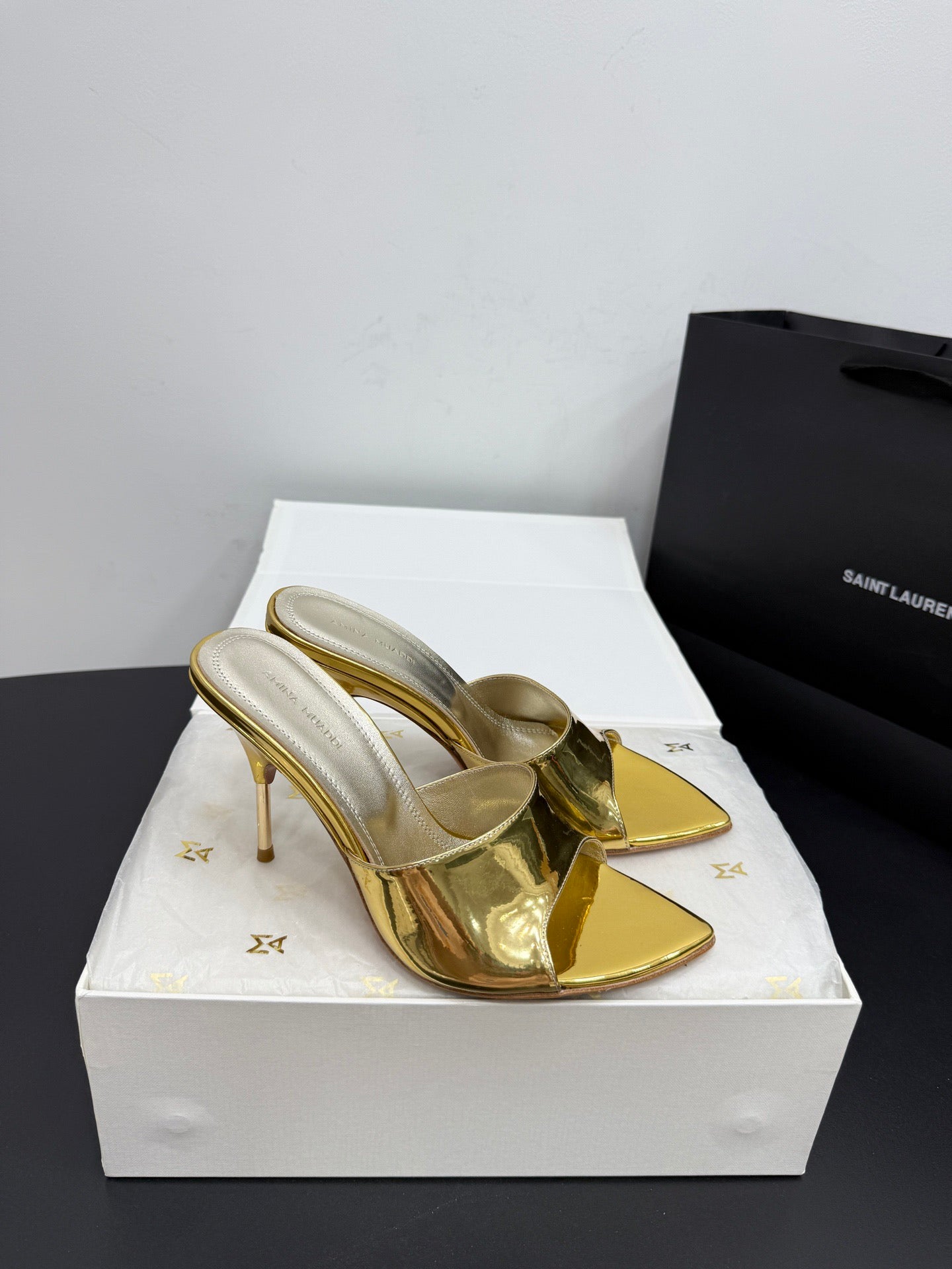 AMINA M HEELS